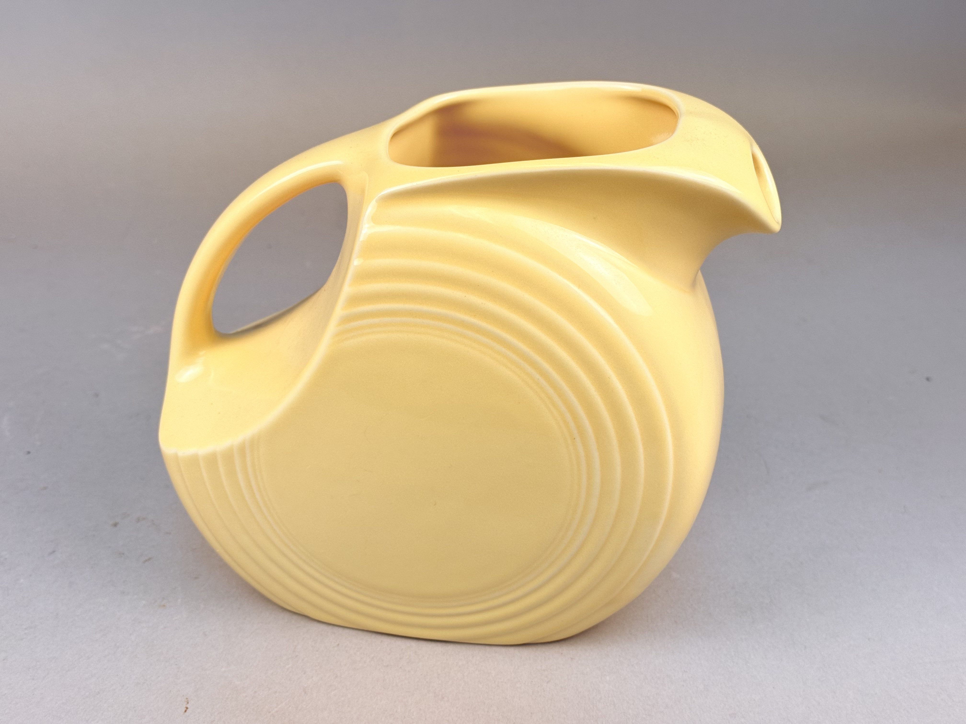 Homer Laughlin Fiesta Yellow Disk Pitcher