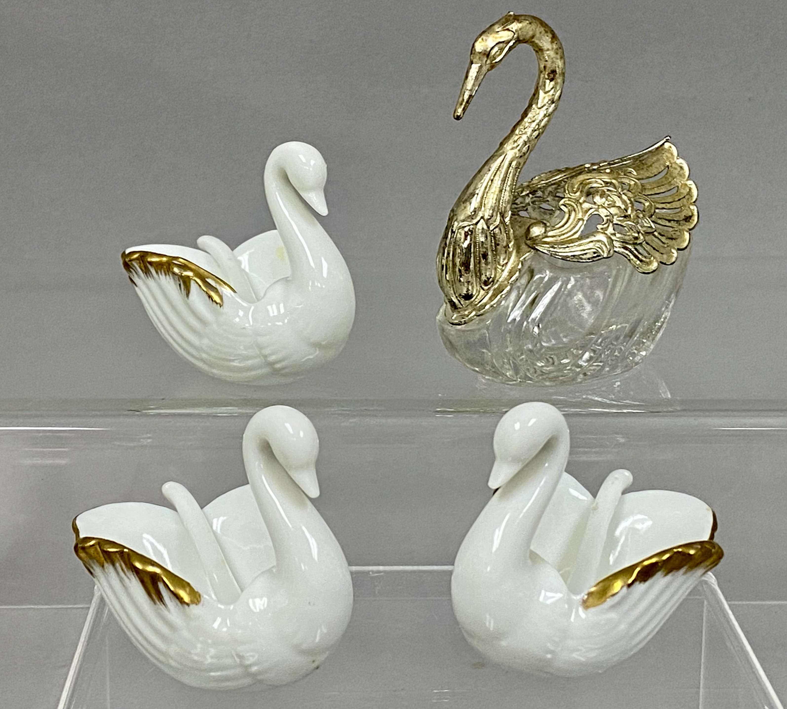 A Collection of Swan Salt Cellars