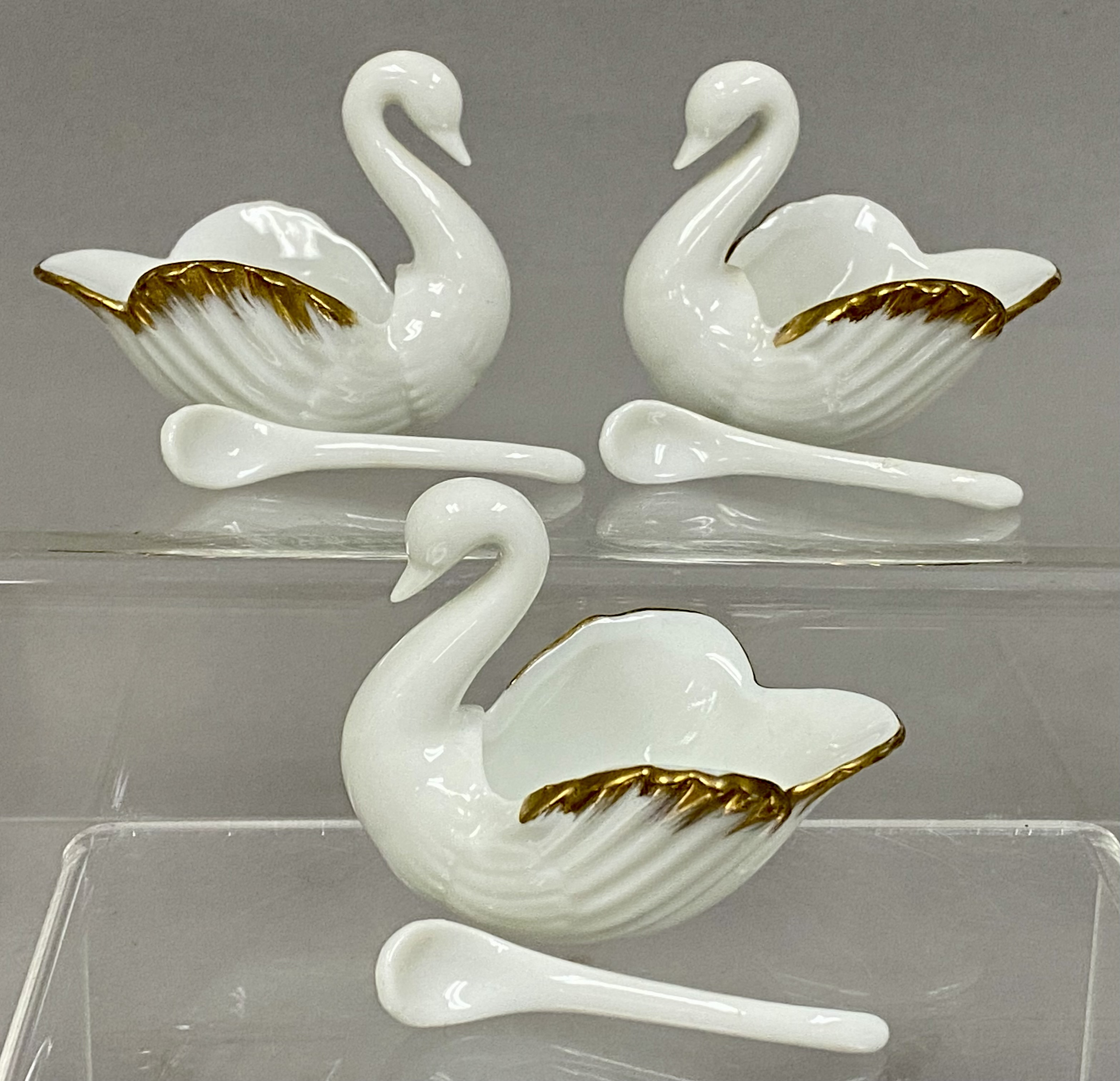 A Collection of Swan Salt Cellars