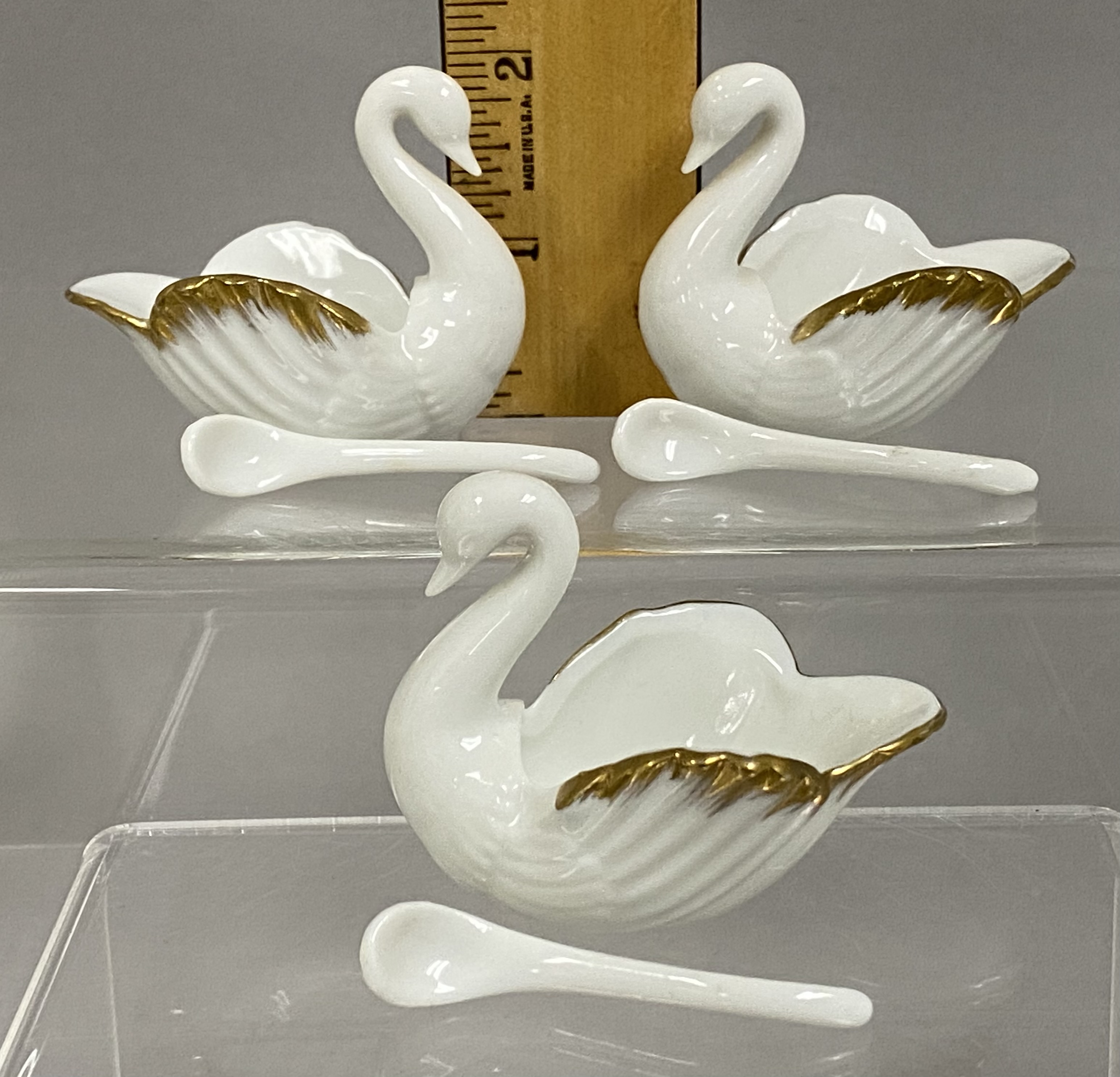 A Collection of Swan Salt Cellars