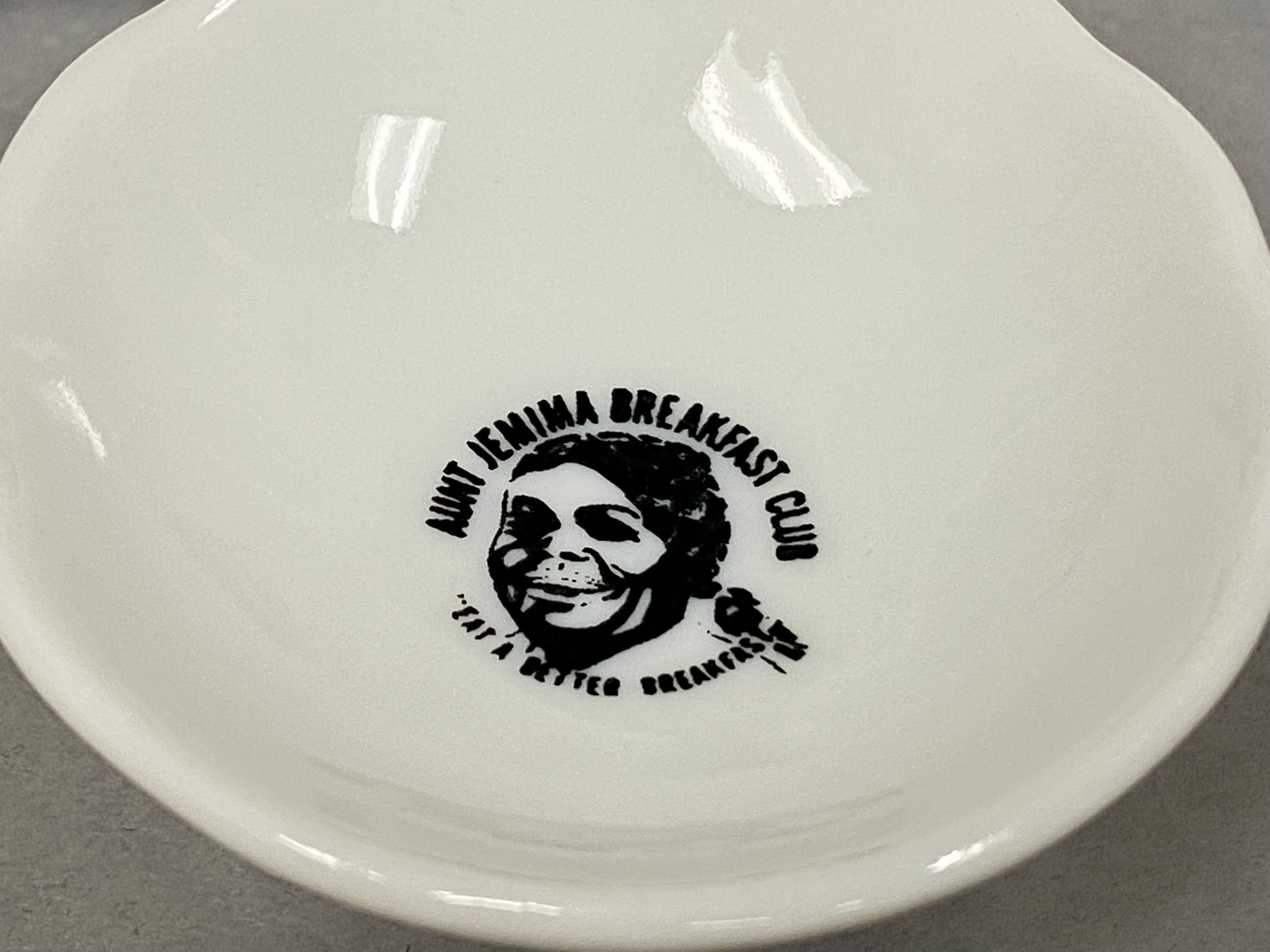 Collection of Four Miniature Advertising Dishes