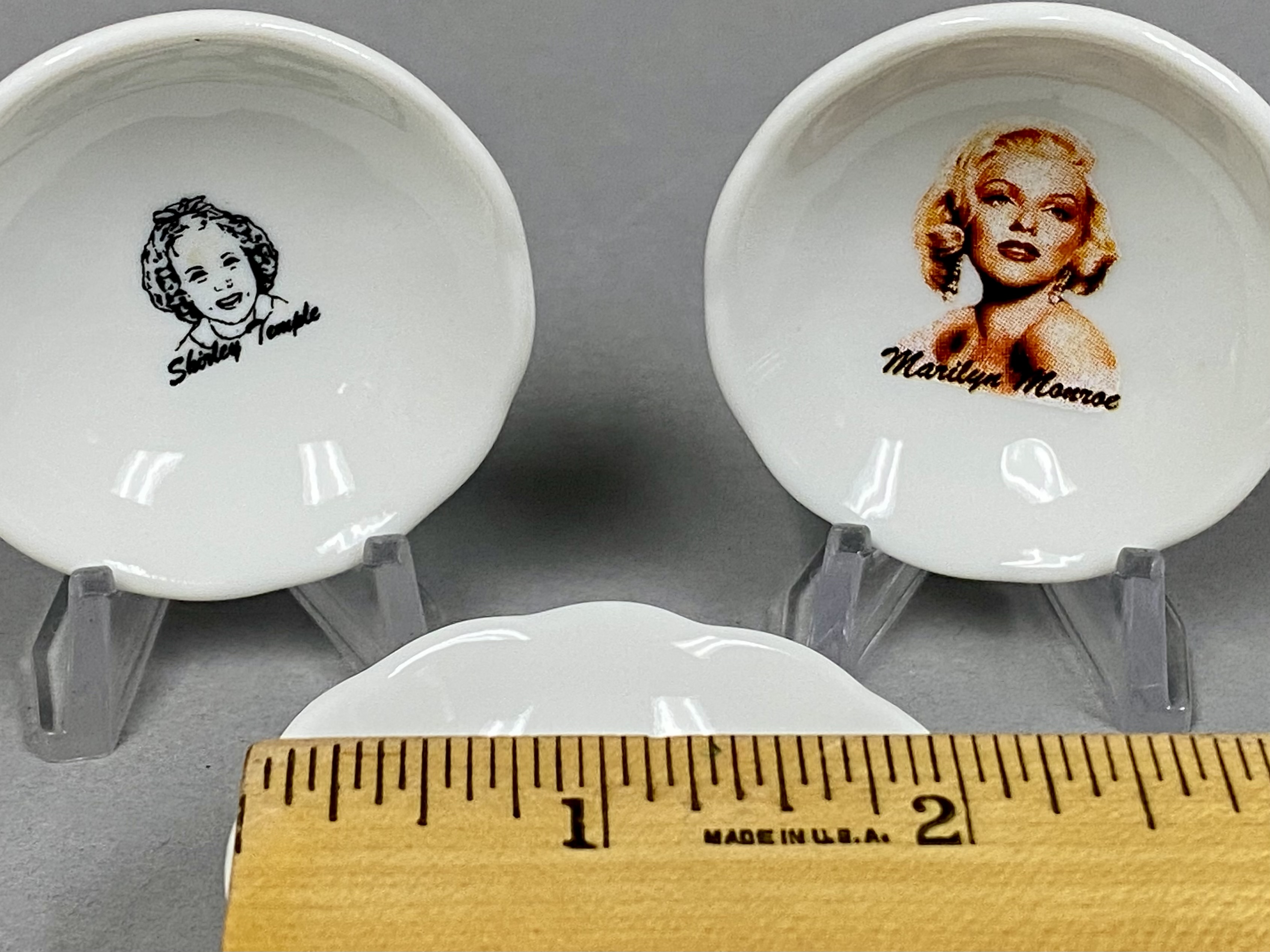 Collection of Four Miniature Advertising Dishes
