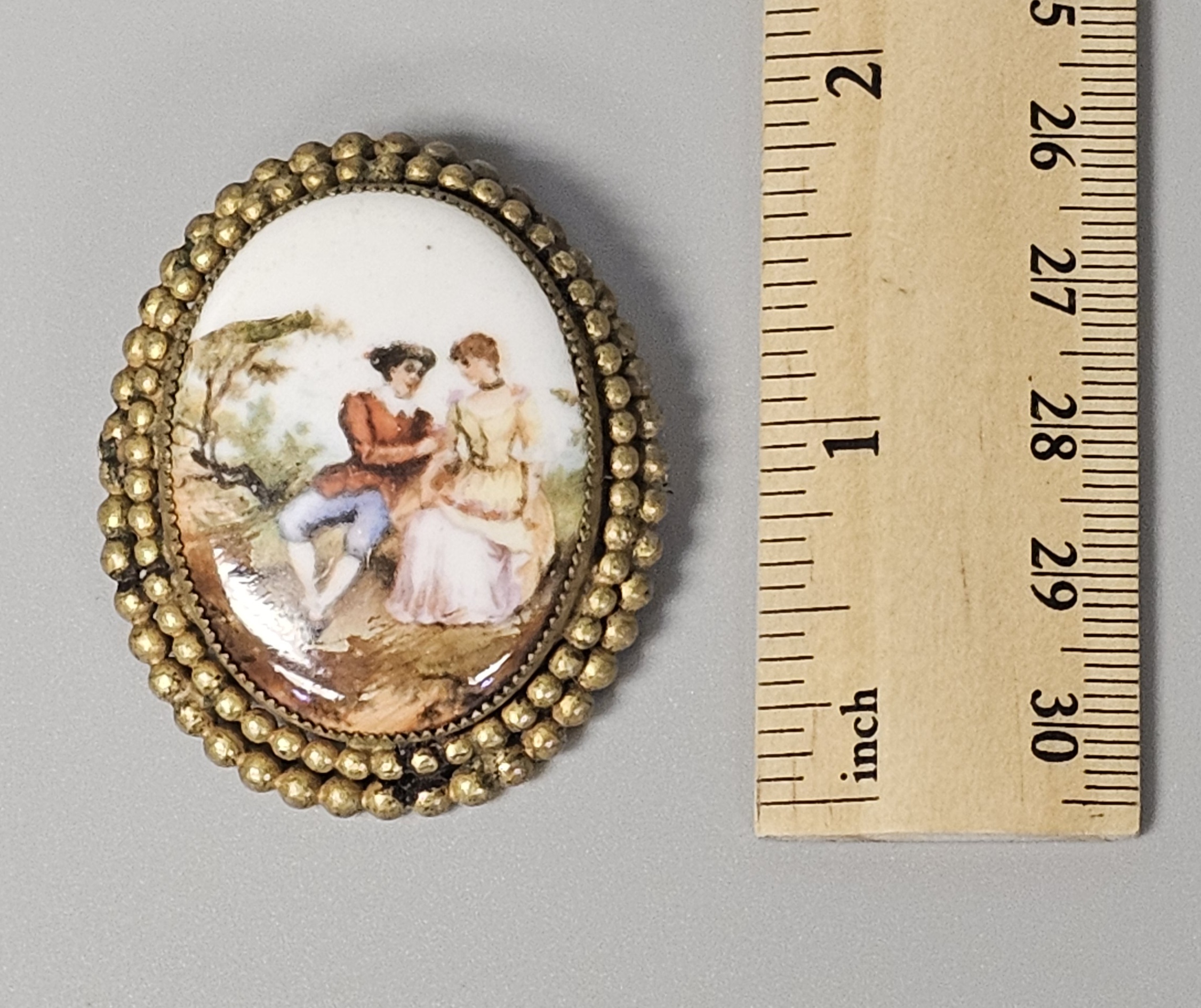Hand-Painted Porcelain Courting Couple Brooch