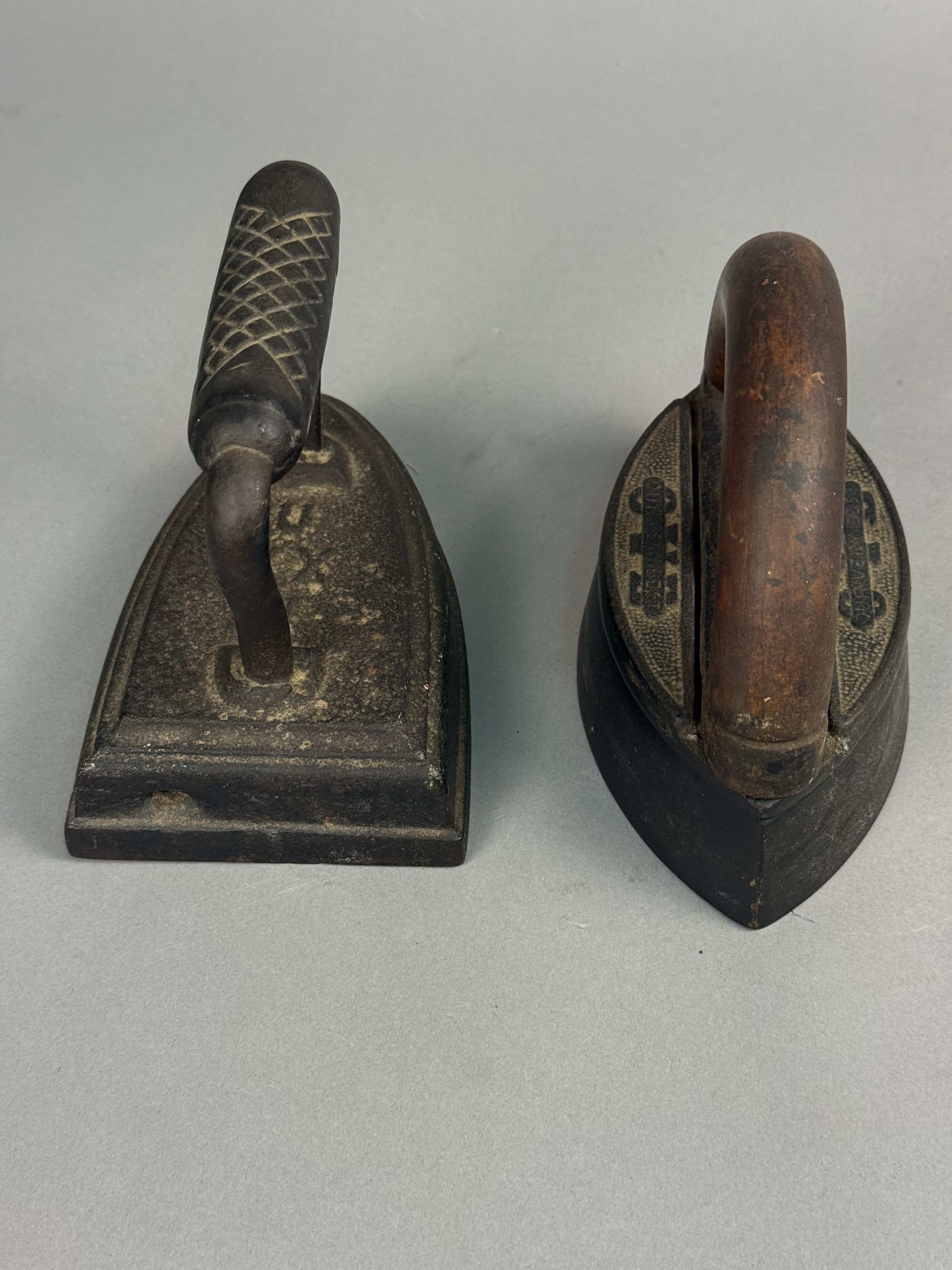 Two Antique Cast Iron Sad Irons