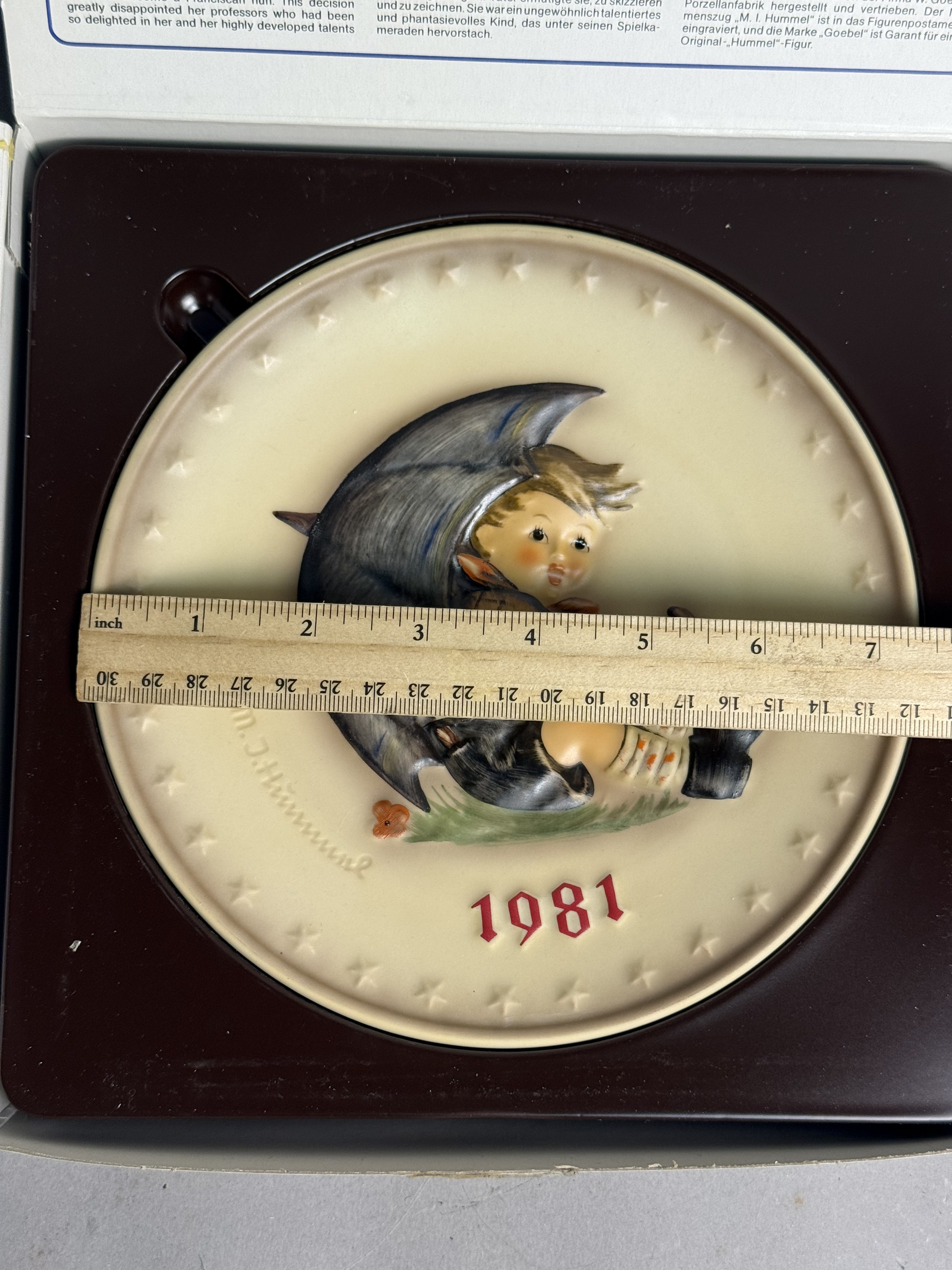 Three Goebel Hummel Annual Plates