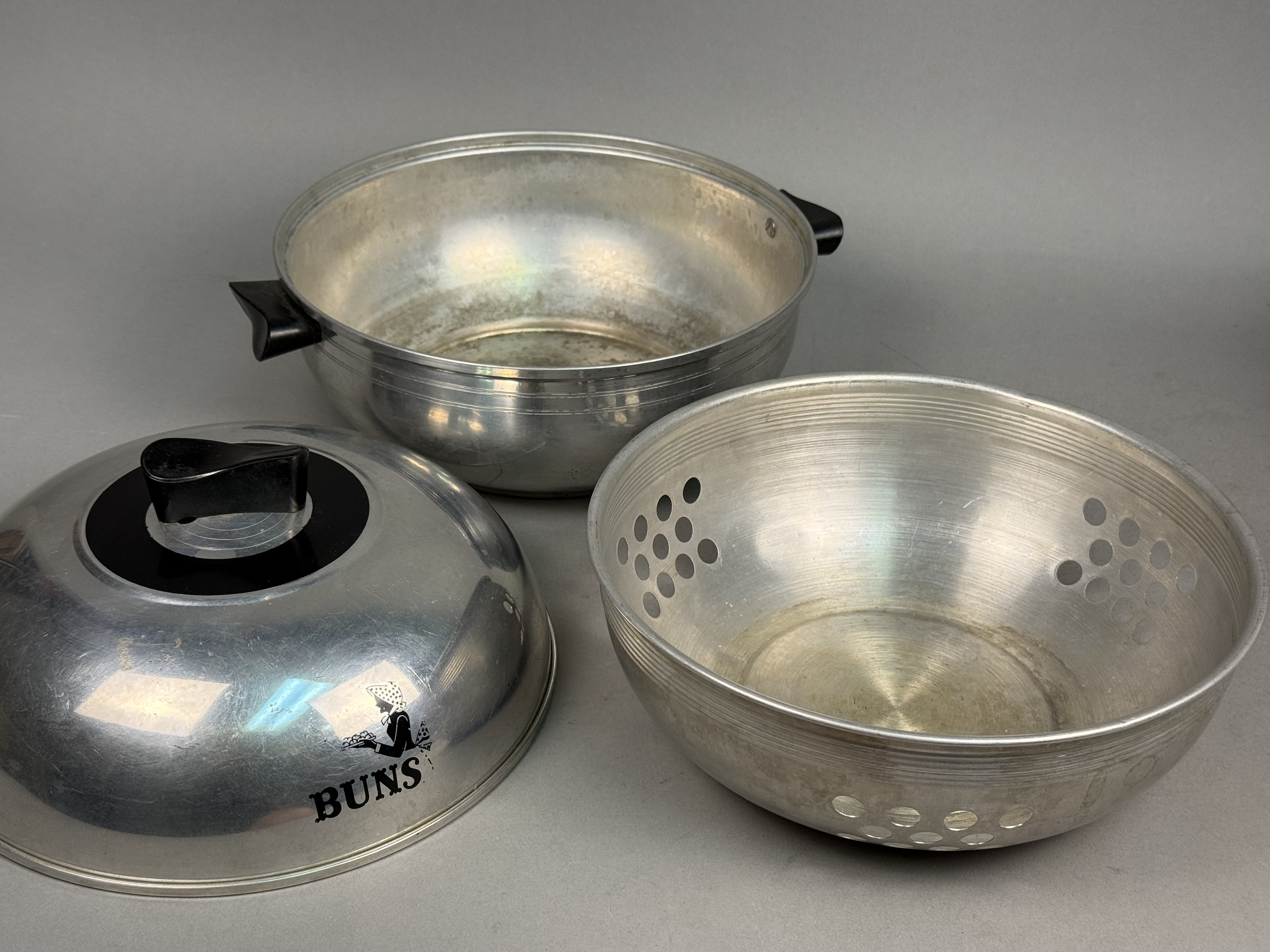 Two West Bend Aluminum Kitchen Items