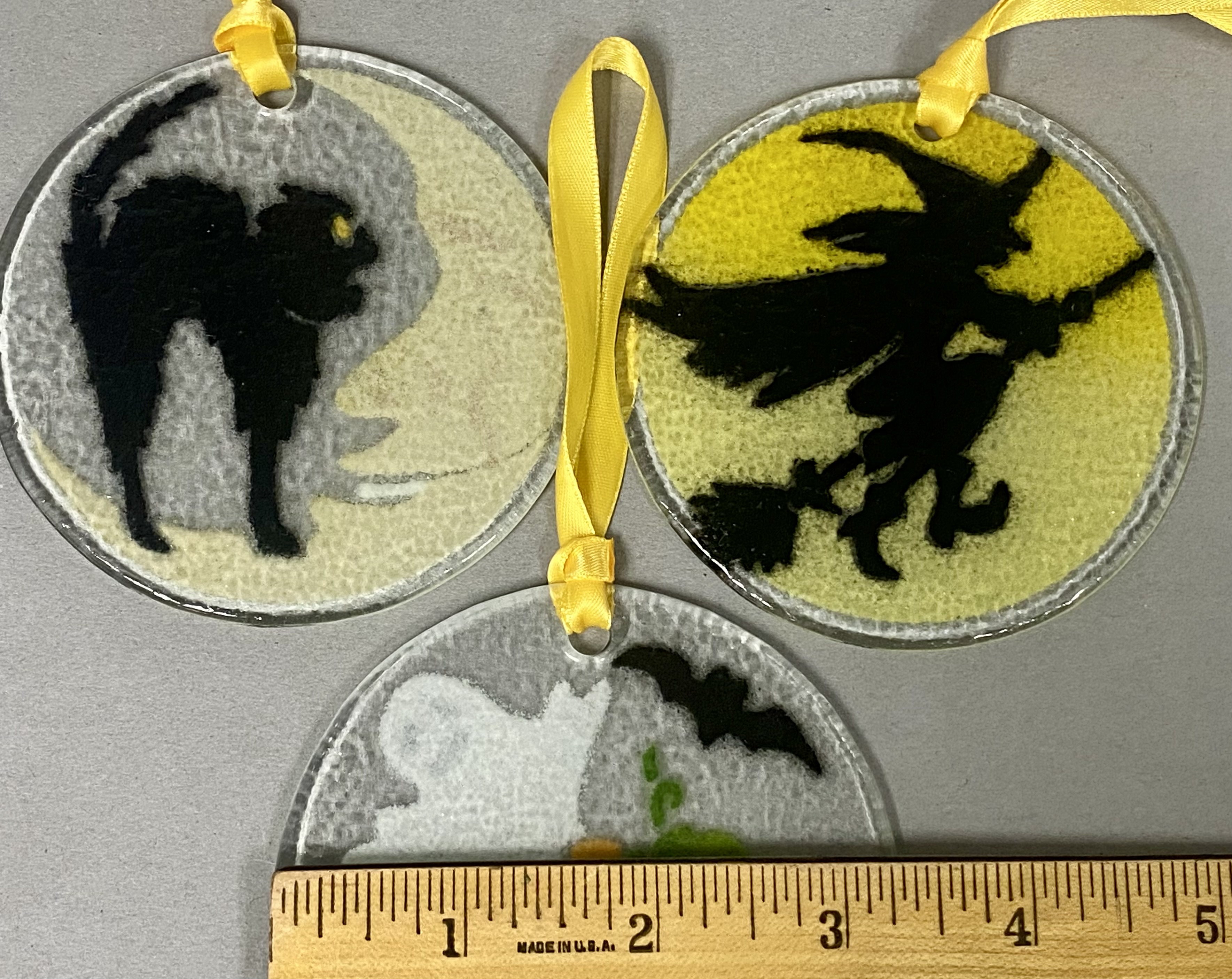 Three Peggy Karr Glass Ornaments