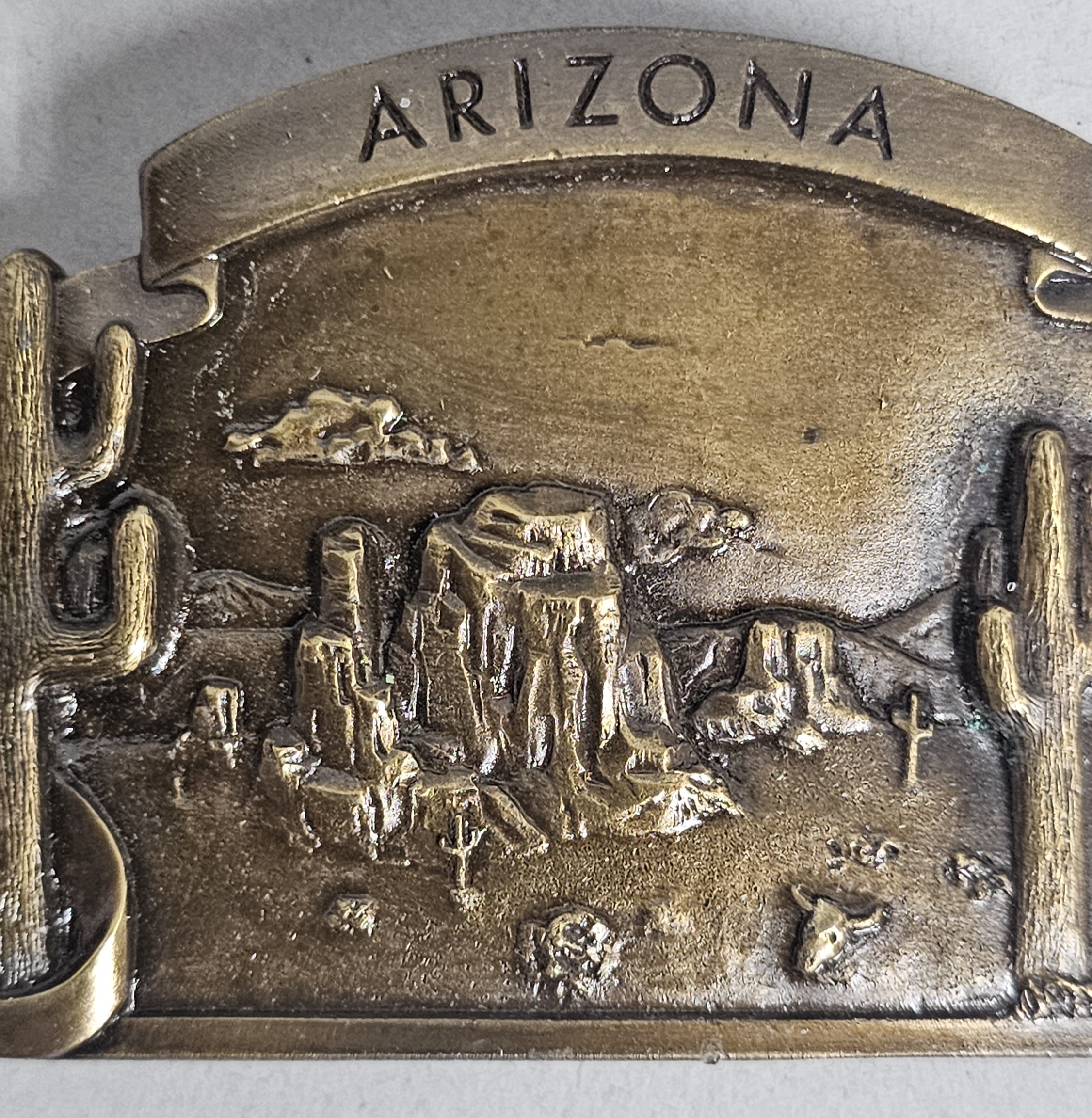 Trio of Souvenir Belt Buckles