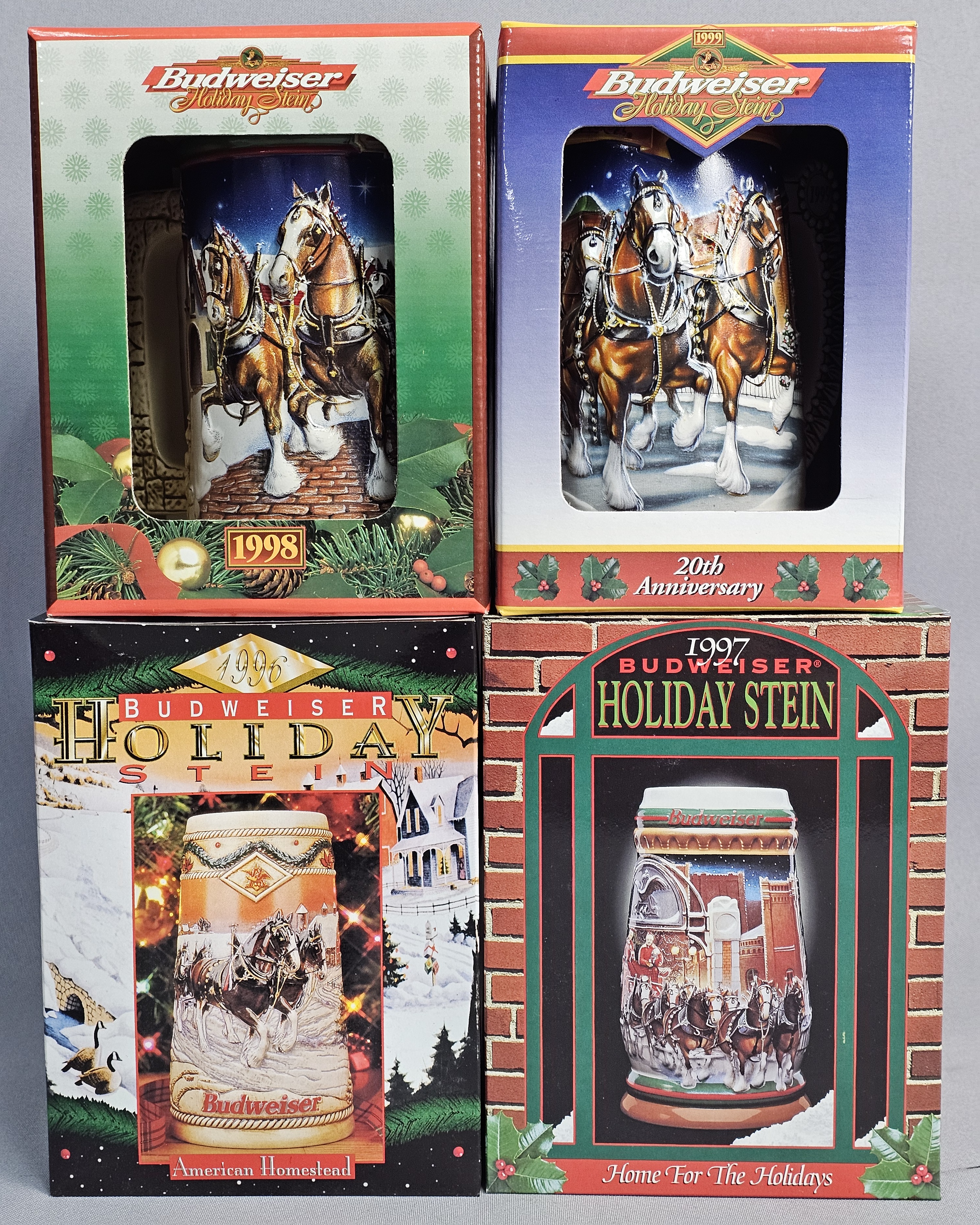 Four Budweiser Holiday Steins 1996-1999