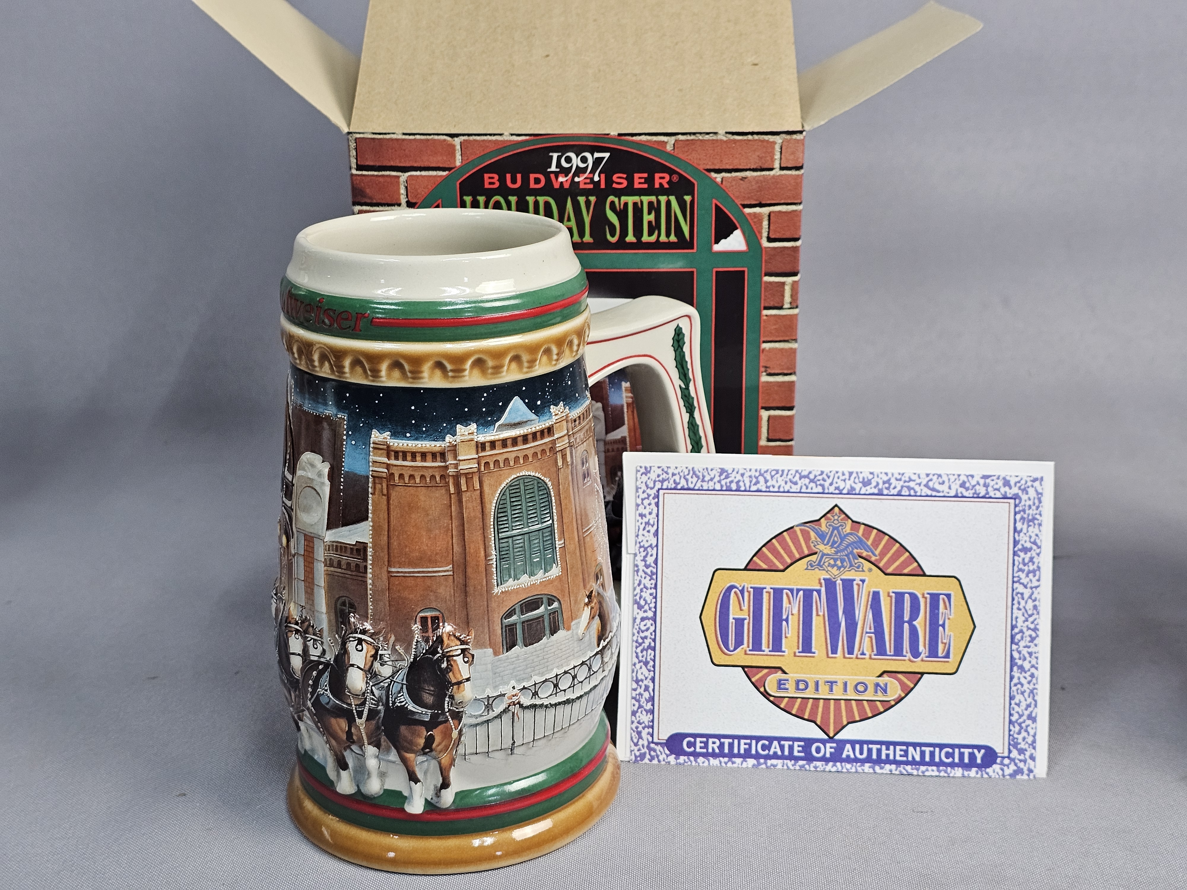 Four Budweiser Holiday Steins 1996-1999