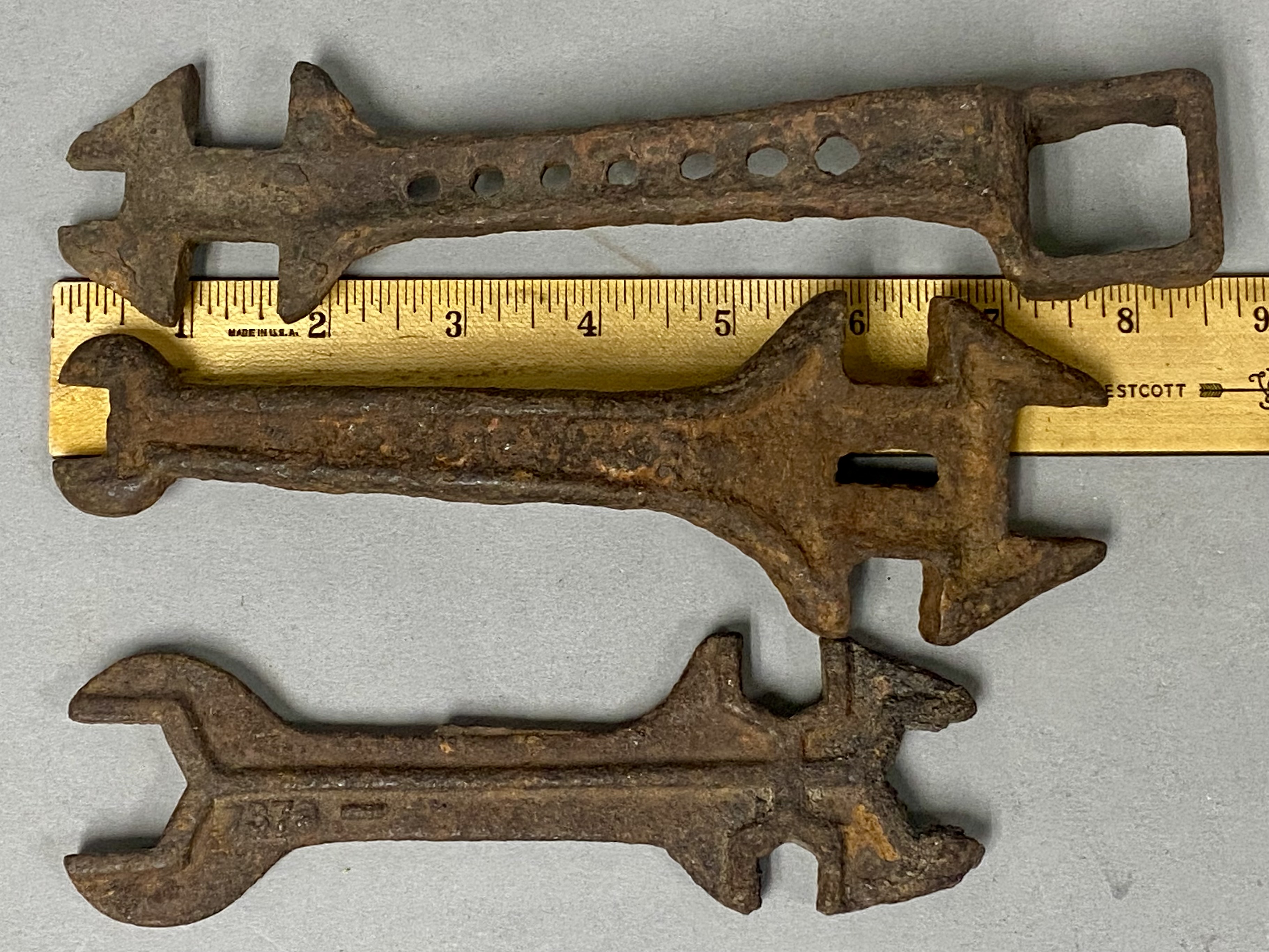 Trio of Antique Cast Iron Implement Wrenches