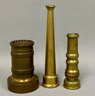 Three Industrial Brass Fire Nozzles. A group of three industrial brass fire nozzles, including 