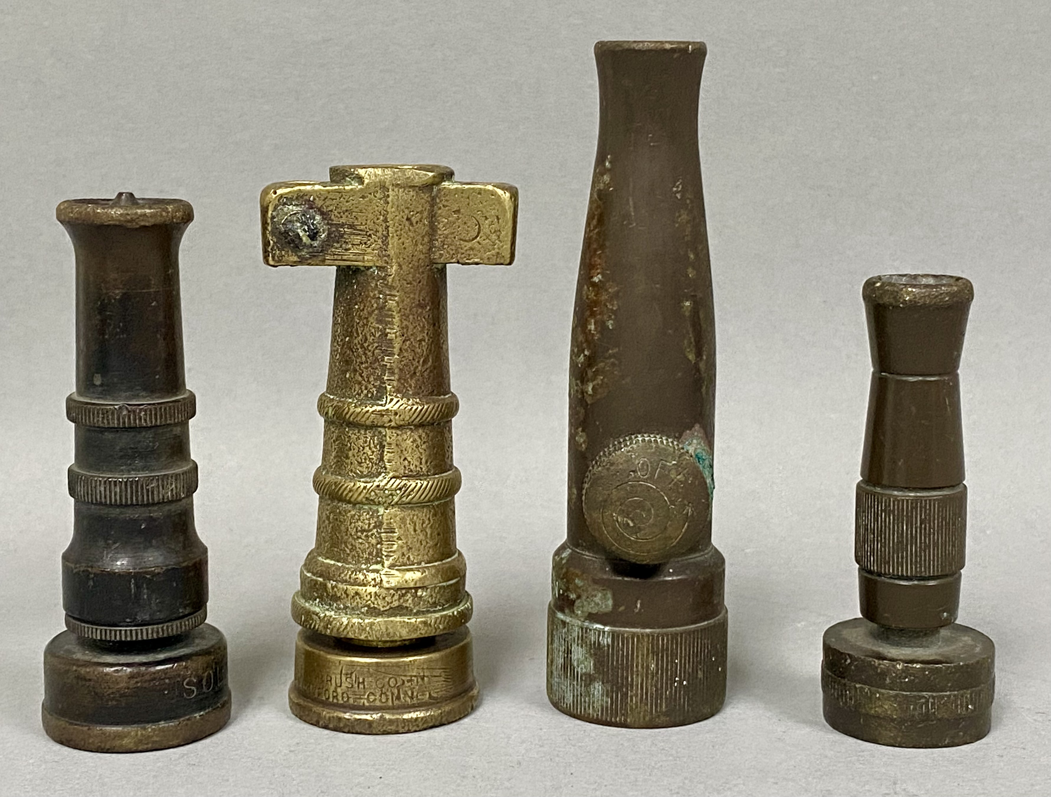 Four Vintage Brass Garden Hose Nozzles