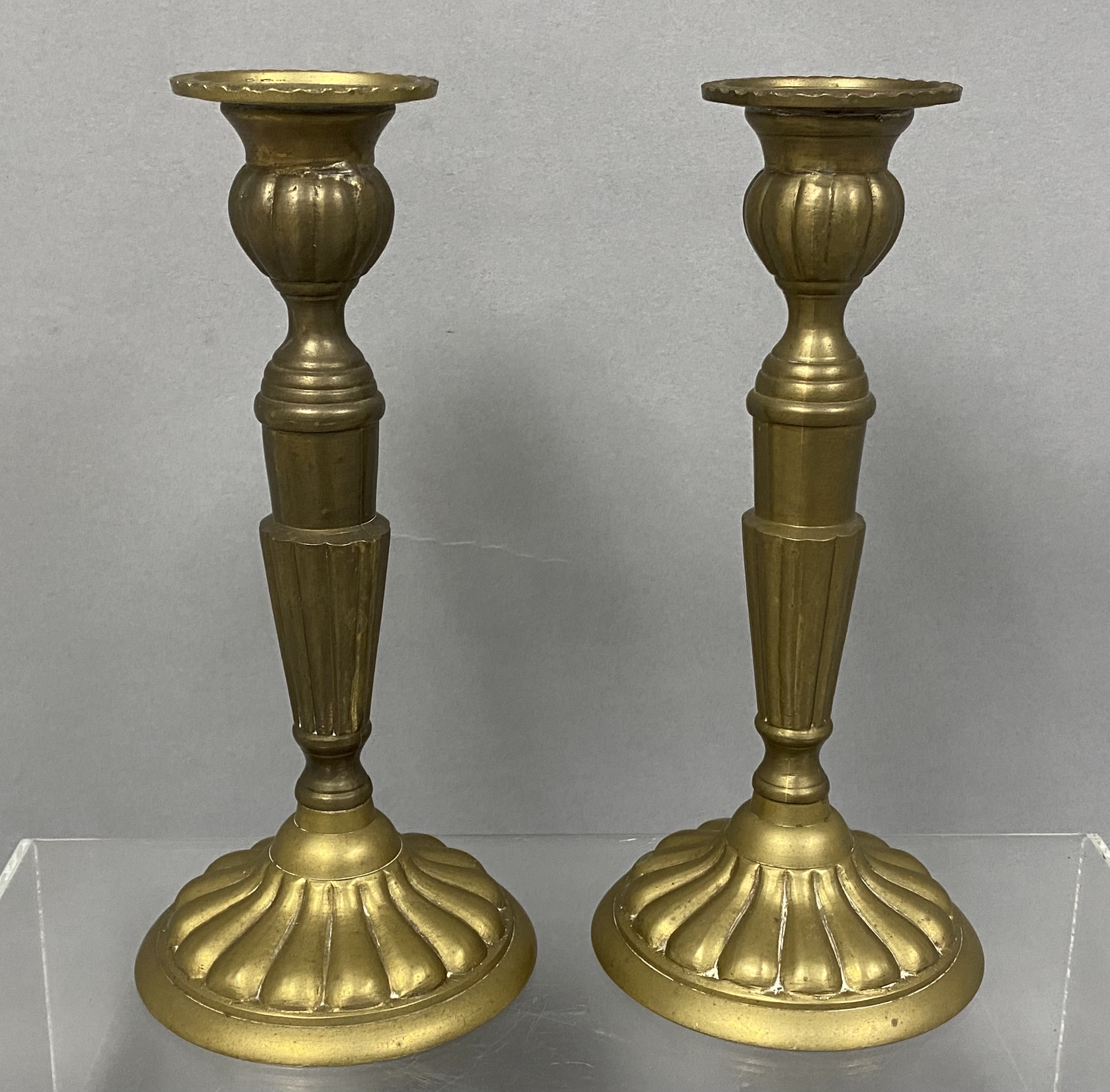 A Pair of Brass Candlesticks