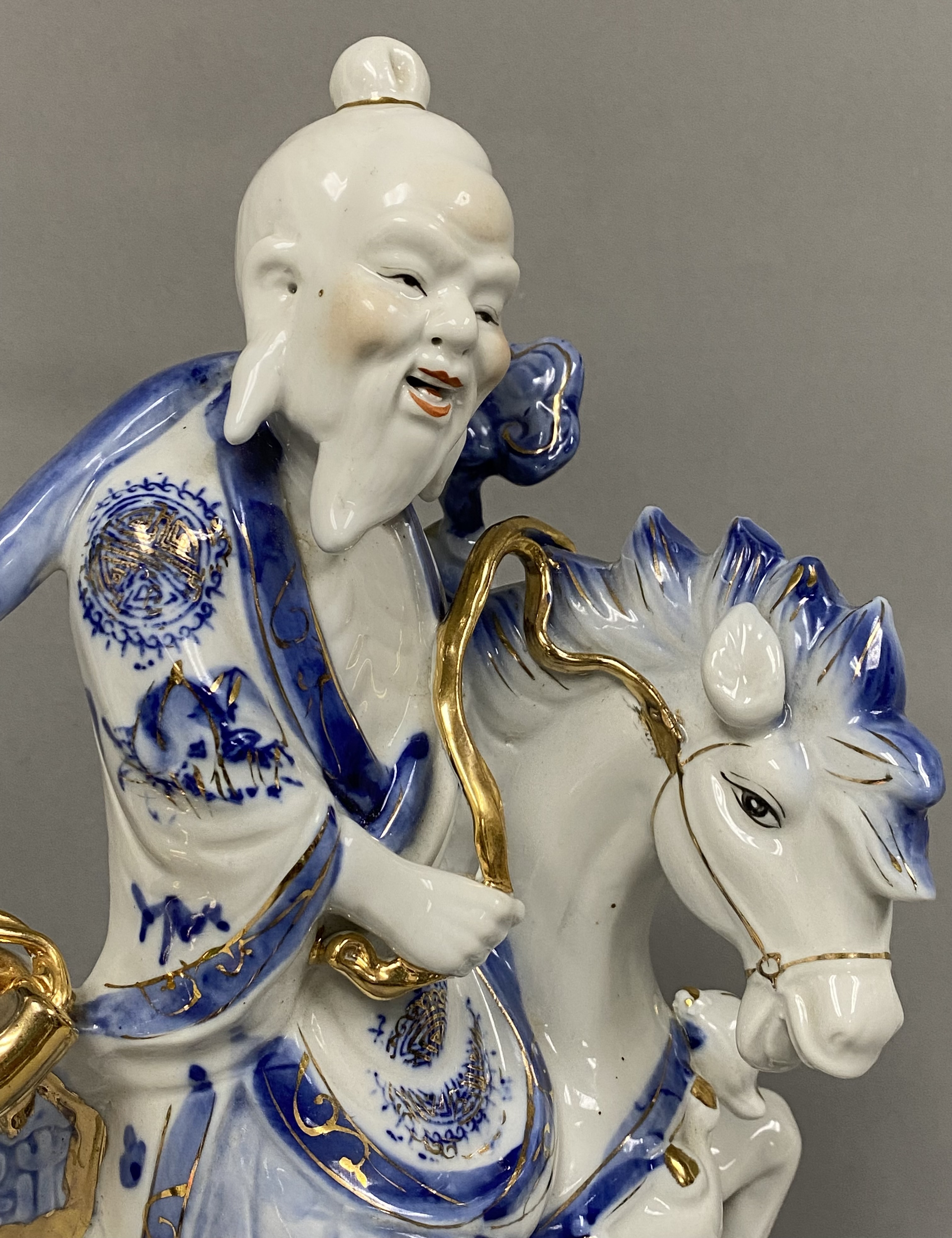 Chinese Gilt Porcelain Sage Riding Horse