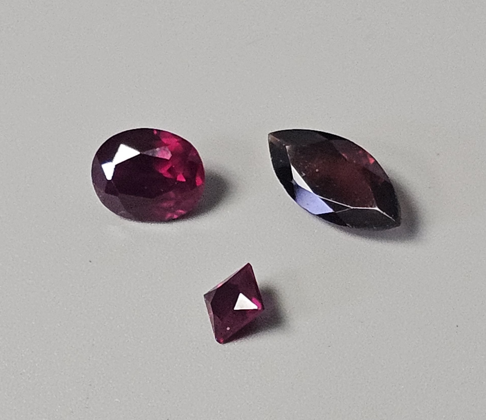 Three Loose Faceted Garnet Gemstones