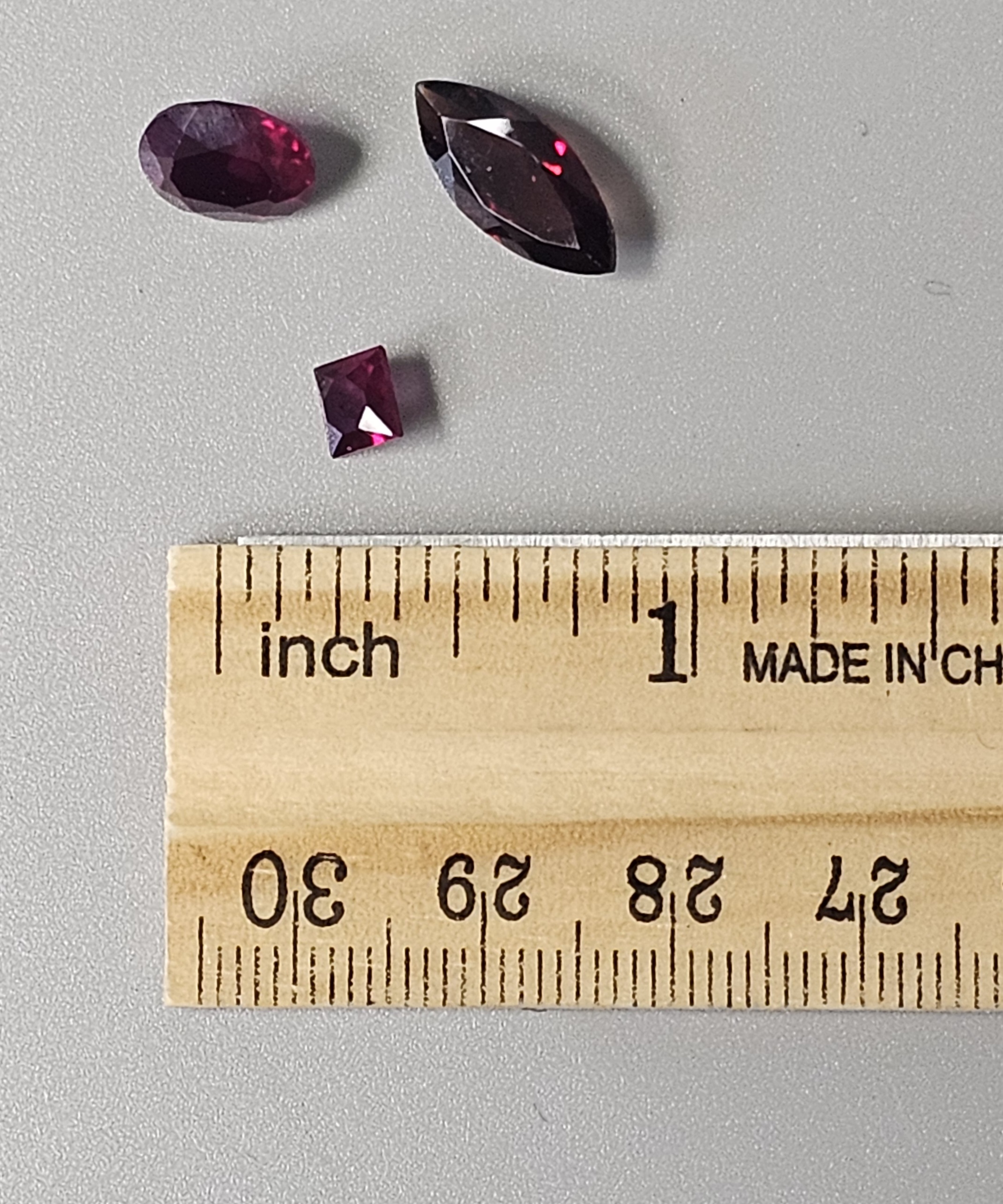 Three Loose Faceted Garnet Gemstones