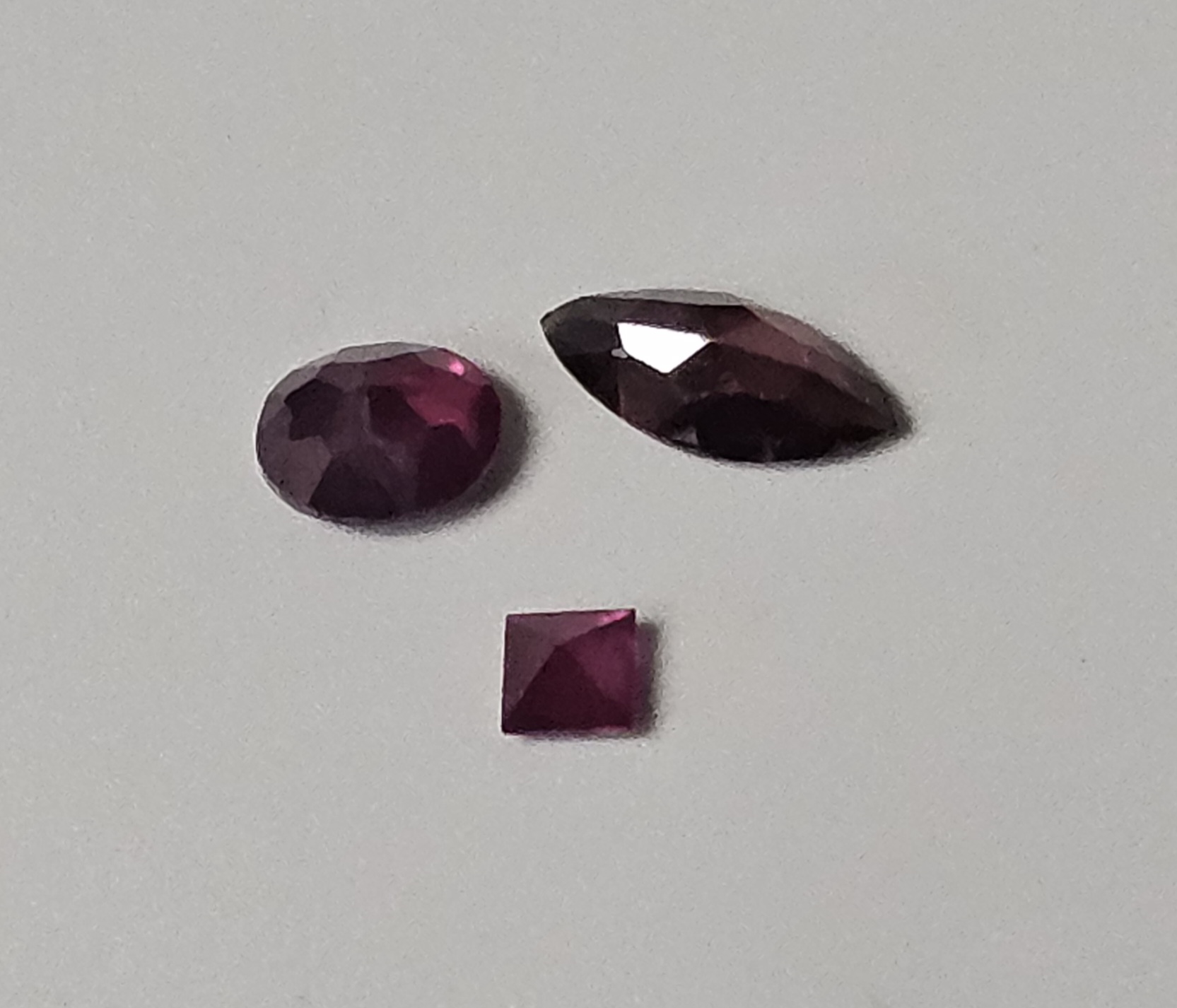 Three Loose Faceted Garnet Gemstones