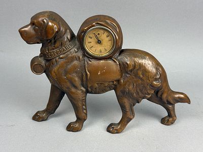 Golden Novelty Cast Metal St. Bernard Clock. A figural mantel clock depicting a St. Bernard 