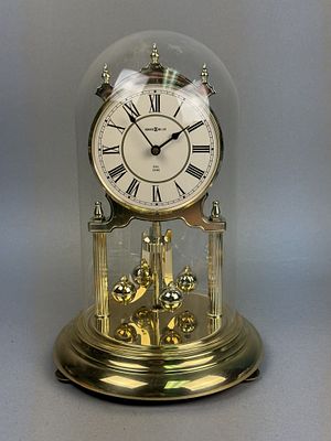 Howard Miller Brass-Tone Dual Chime Anniversary Clock. A Howard Miller anniversary mantel clock 