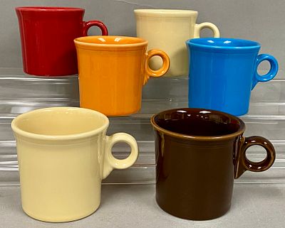 Fiesta Ring Handle Mugs. A set of six glazed earthenware mugs in the Ring Handle style from the 