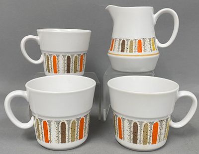Noritake Progression Mardi Gras Porcelain Set. A four-piece coordinating service set from the 