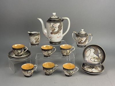 Porcelain Moriage Dragon Tea Set. A porcelain tea set featuring raised moriage dragon 