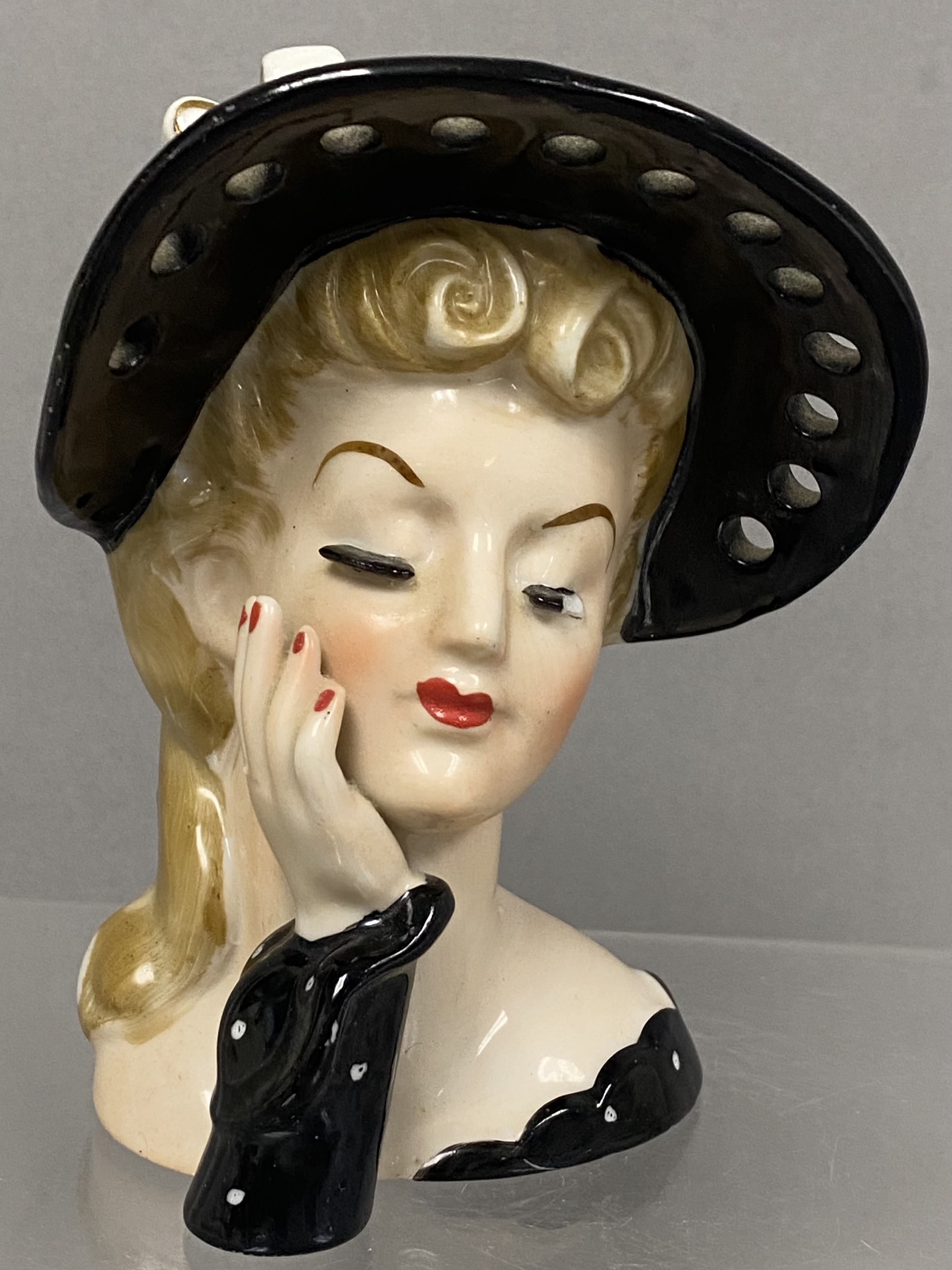 Two Porcelain Lady Head Vases