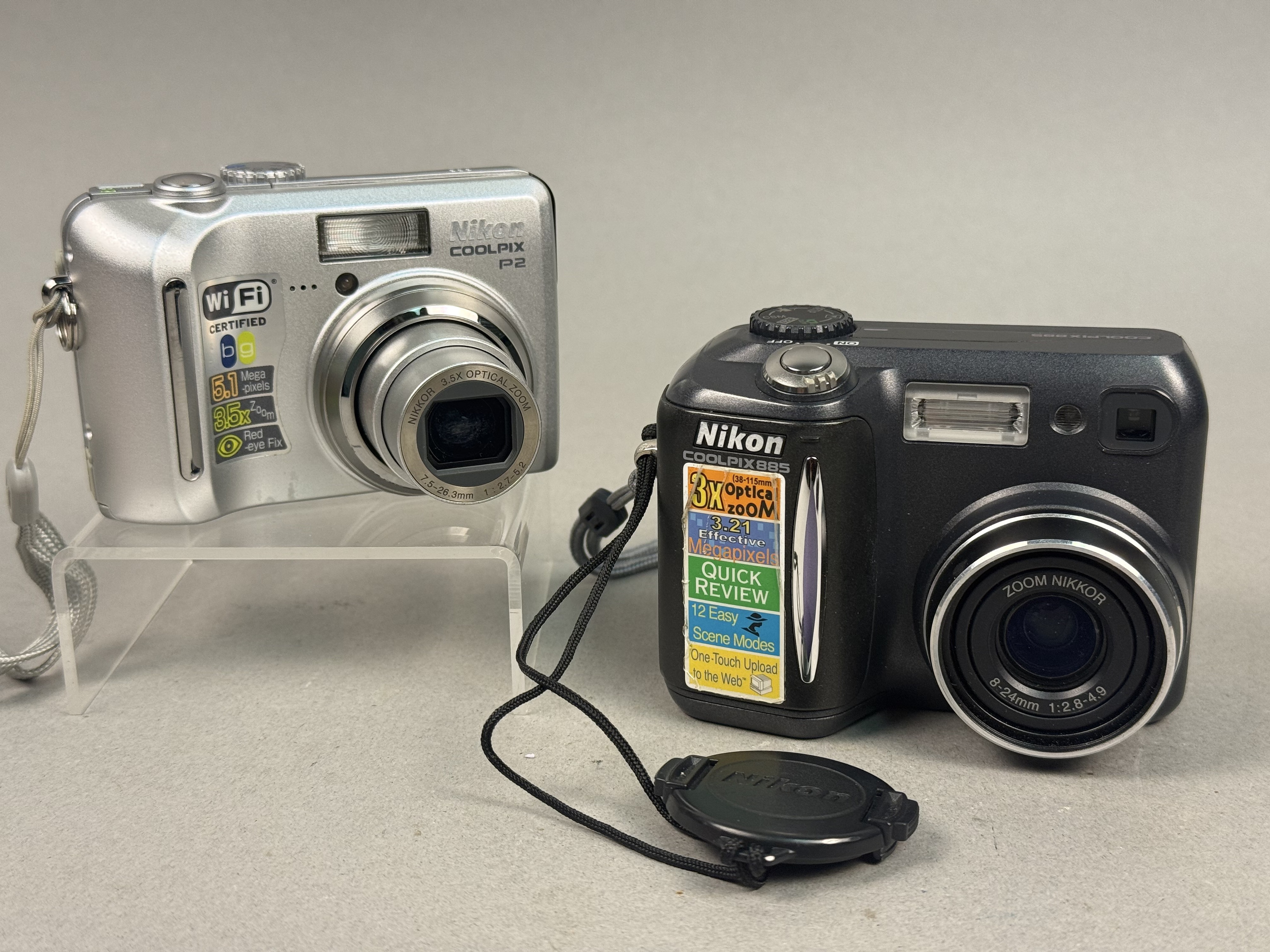 Two Nikon Coolpix Digital Cameras