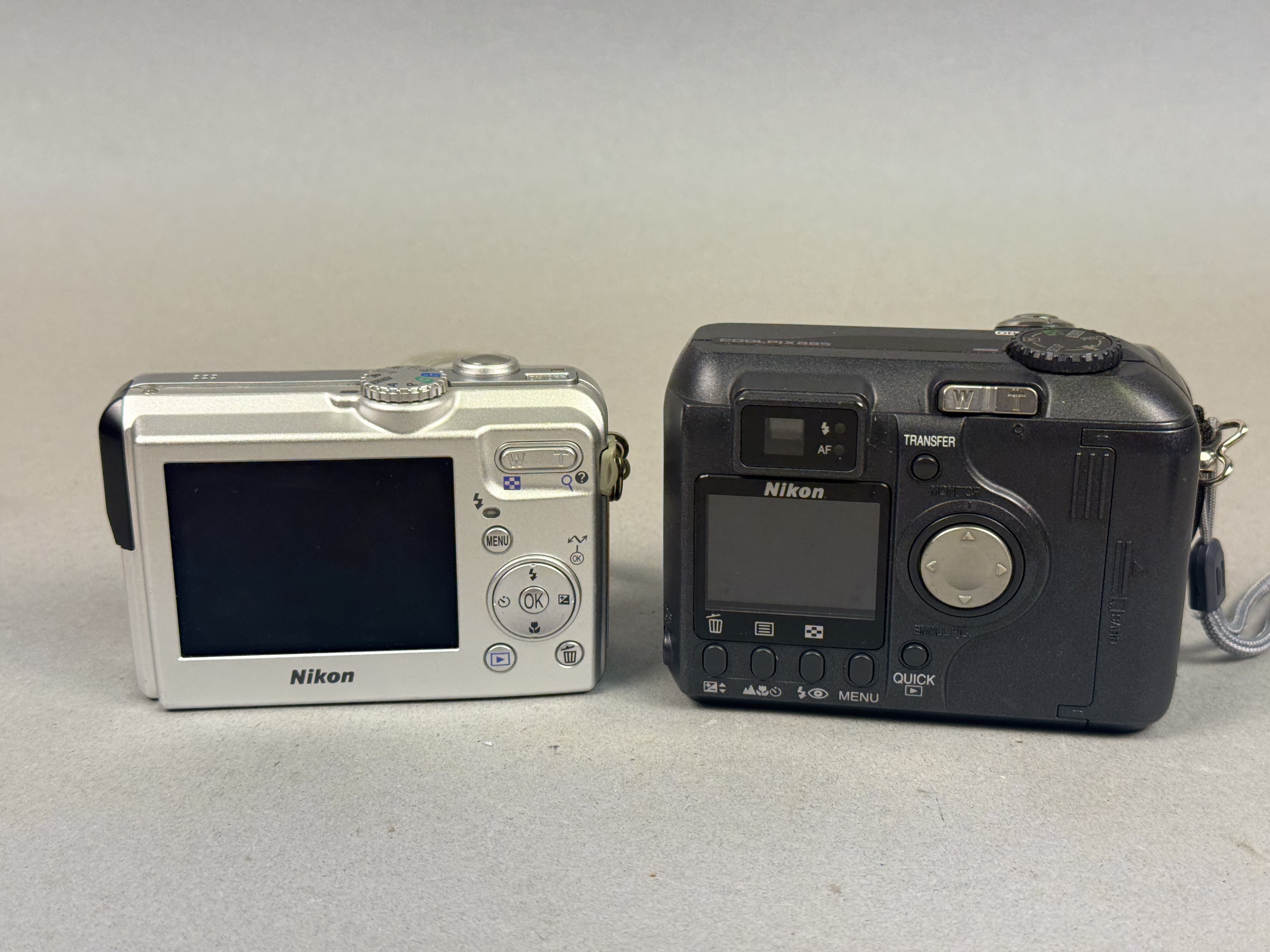 Two Nikon Coolpix Digital Cameras