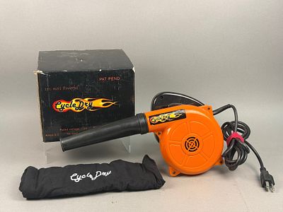 Cycle Dry Portable Motorcycle Blower. An orange plastic handheld blower unit designed for drying 