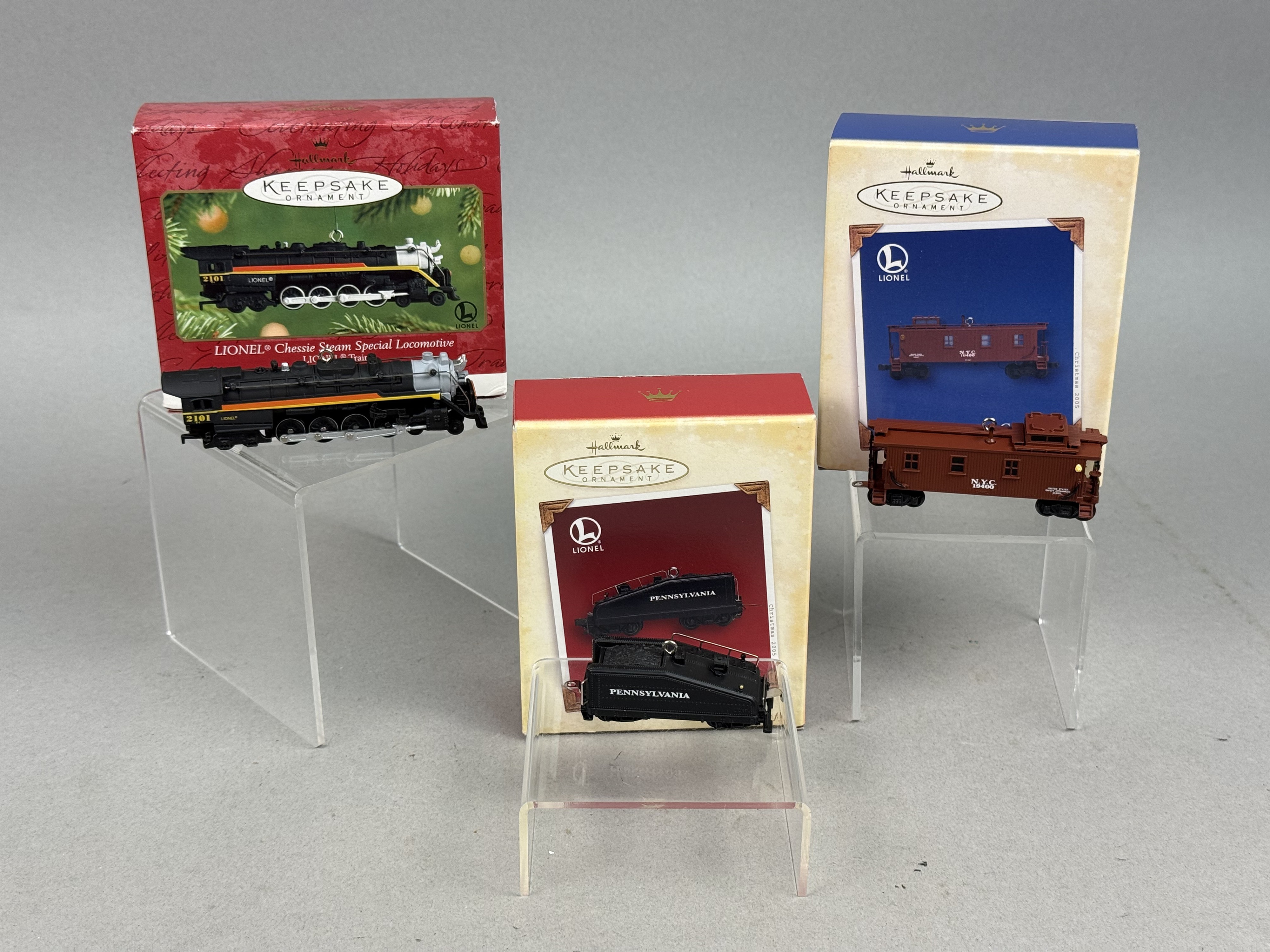 Three Hallmark Lionel Die-Cast Train Ornaments