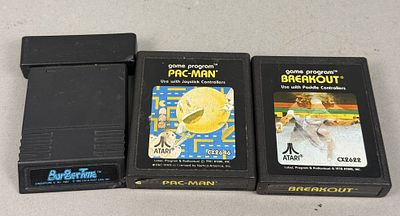 Three Atari 2600 Plastic Game Cartridges. This collection of vintage home console cartridges 