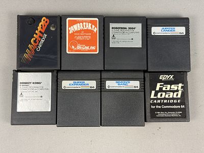 Commodore 64 and 128 Software Cartridge Collection. A collection of eight plastic software 
