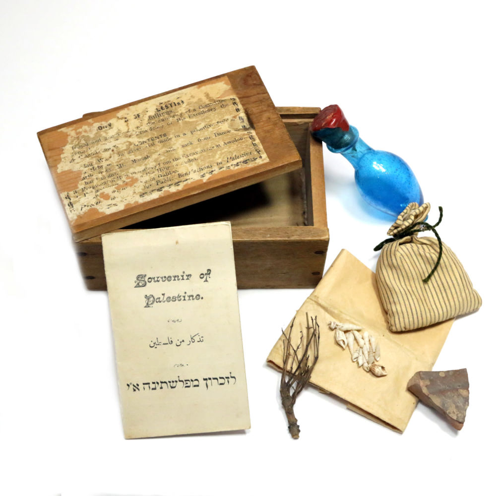 “SOUVENIR OF PALESTINE.” 
Hebron, c. 1920. 
Wooden box with sliding lid revealing contents: 
* 