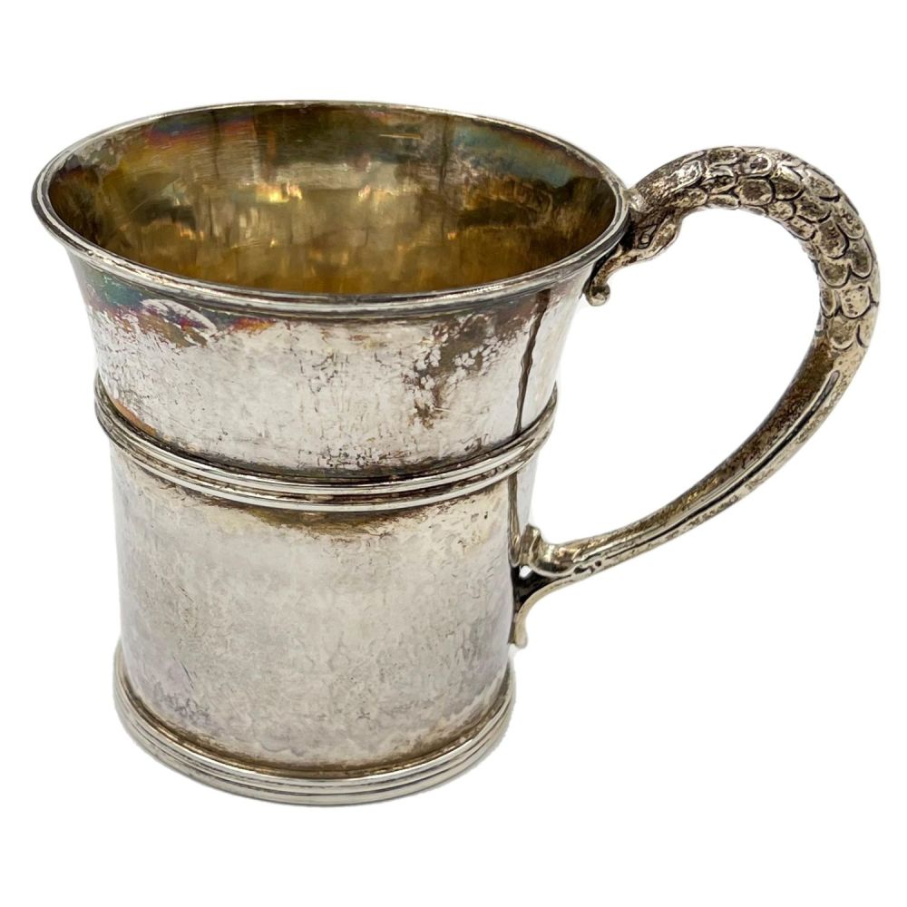 Lot 166: AN UNUSUAL SILVER CHRISTENING MUG OF TAPERING FORM...