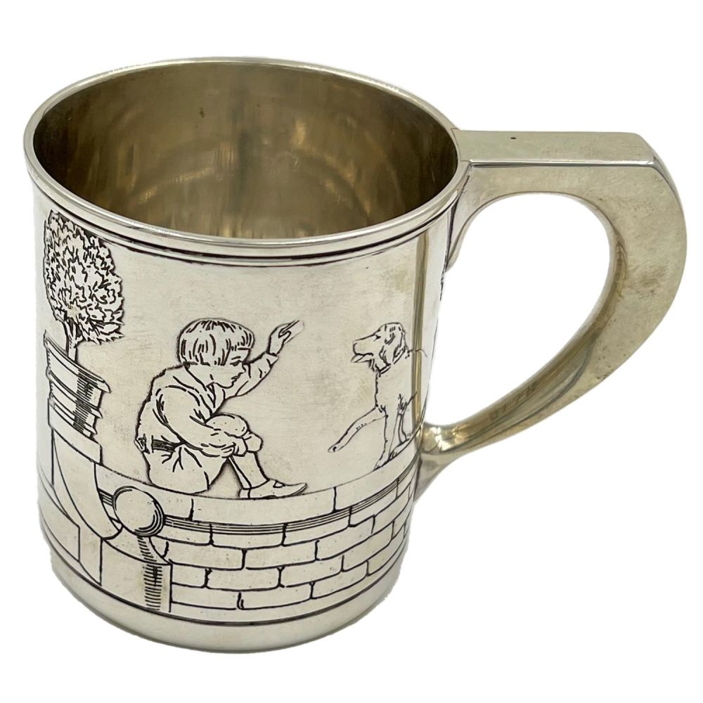 Lot 171: AN UNUSUAL TIFFANY AND CO SILVER CHRISTENING MUG...