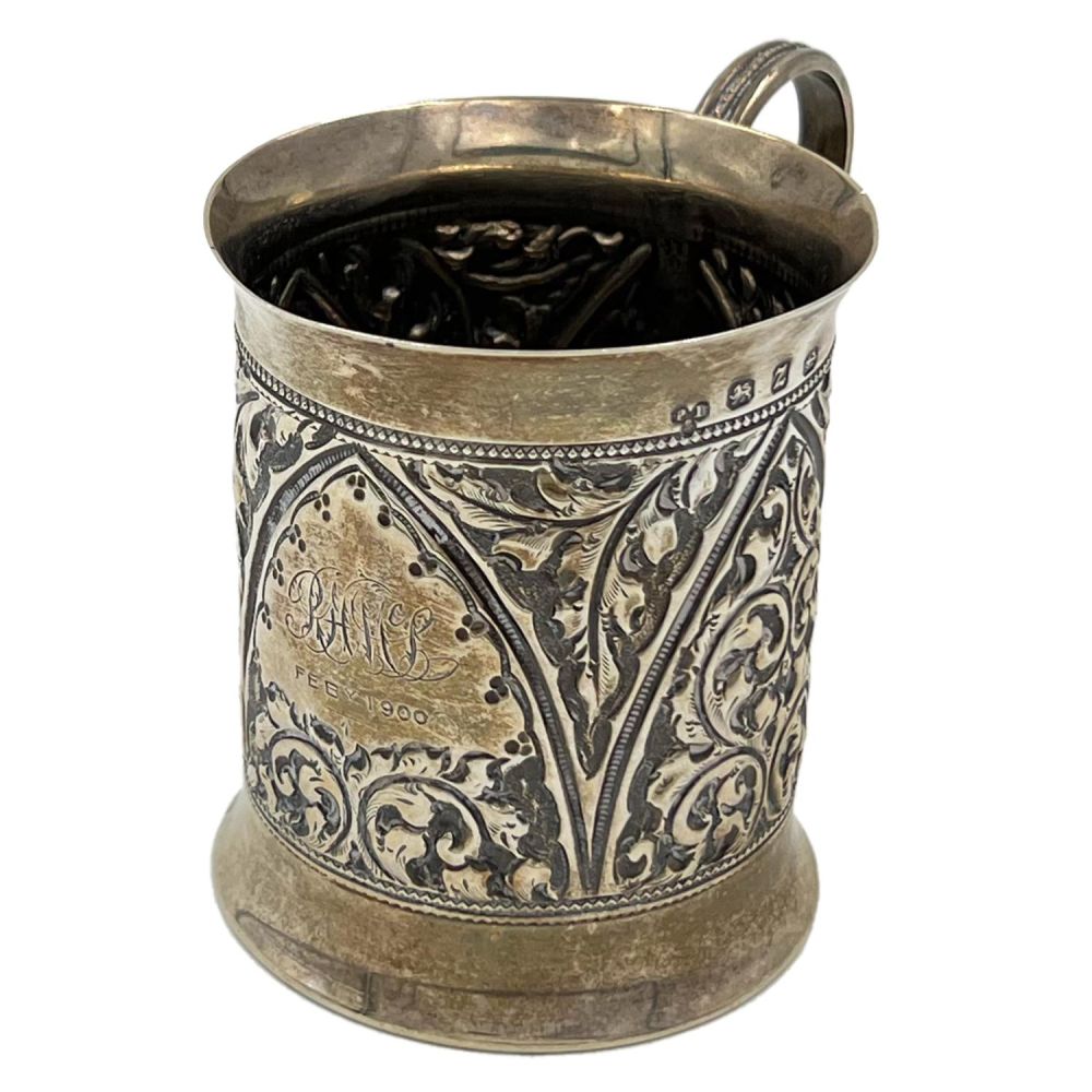 Lot 172: AN EMBOSSED SILVER CHRISTENING MUG, BIRMINGHAM, CIRCA 1899