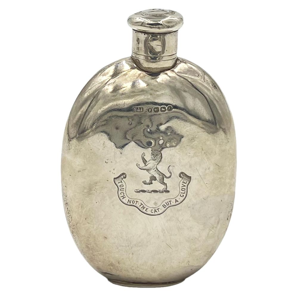 Lot 228: A SILVER HIP FLASK WITH A CREST OF...