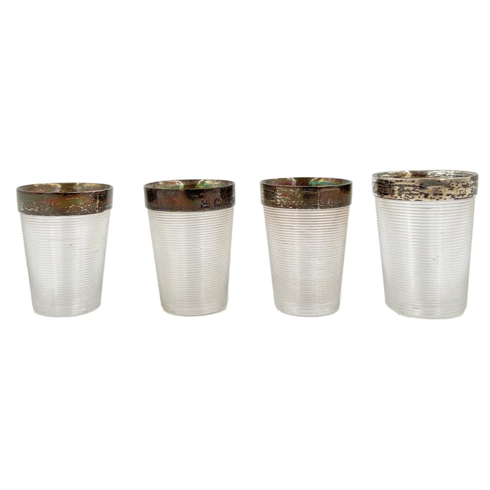 Lot 233: A SET OF FOUR SILVER MOUNTED GRADUATED, STACKING...