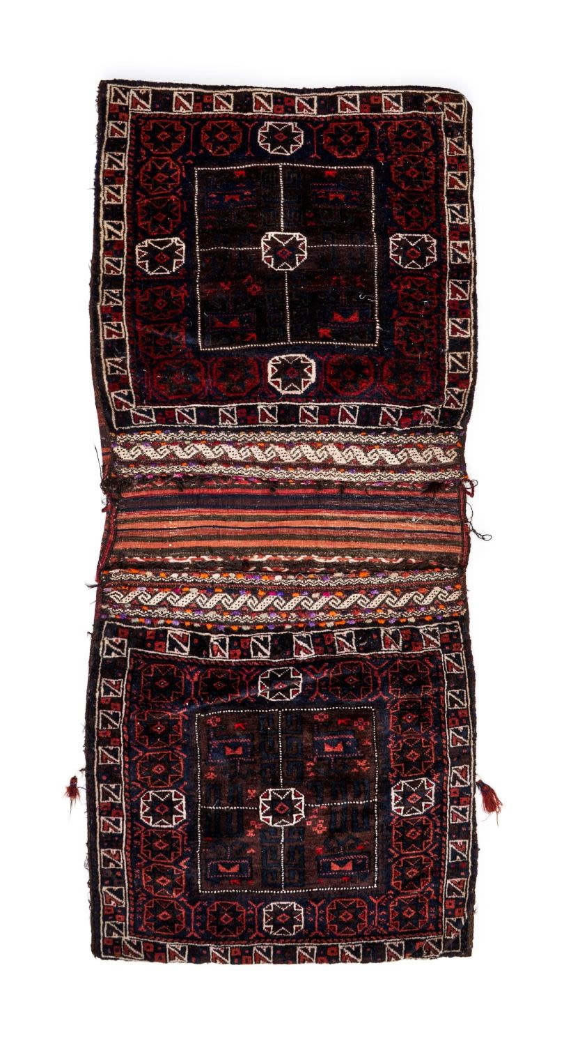 Lot 271: A HAND KNOTTED WOOL HORSE SADDLE BAG, BALUNCH...