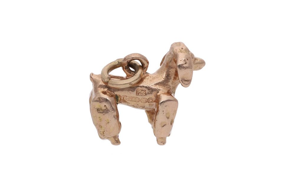 Lot 195: 9ct Gold Poodle Dog Charm.