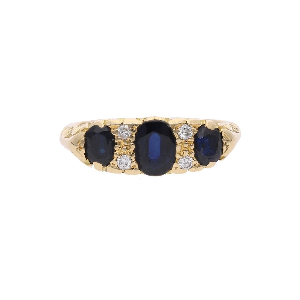 Lot 339: 18ct Gold Sapphire and Diamond Three Stone Ring.