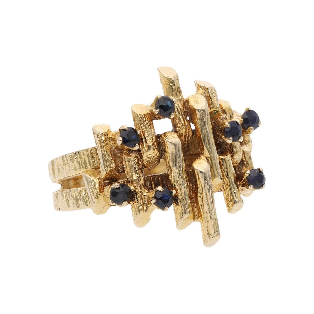 Lot 342: Unusual 9ct Gold and Sapphire Barked Ring.