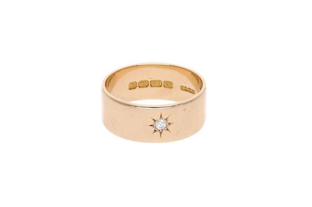 Lot 351: 18ct Gold and Single Diamond Band Ring, Size V.