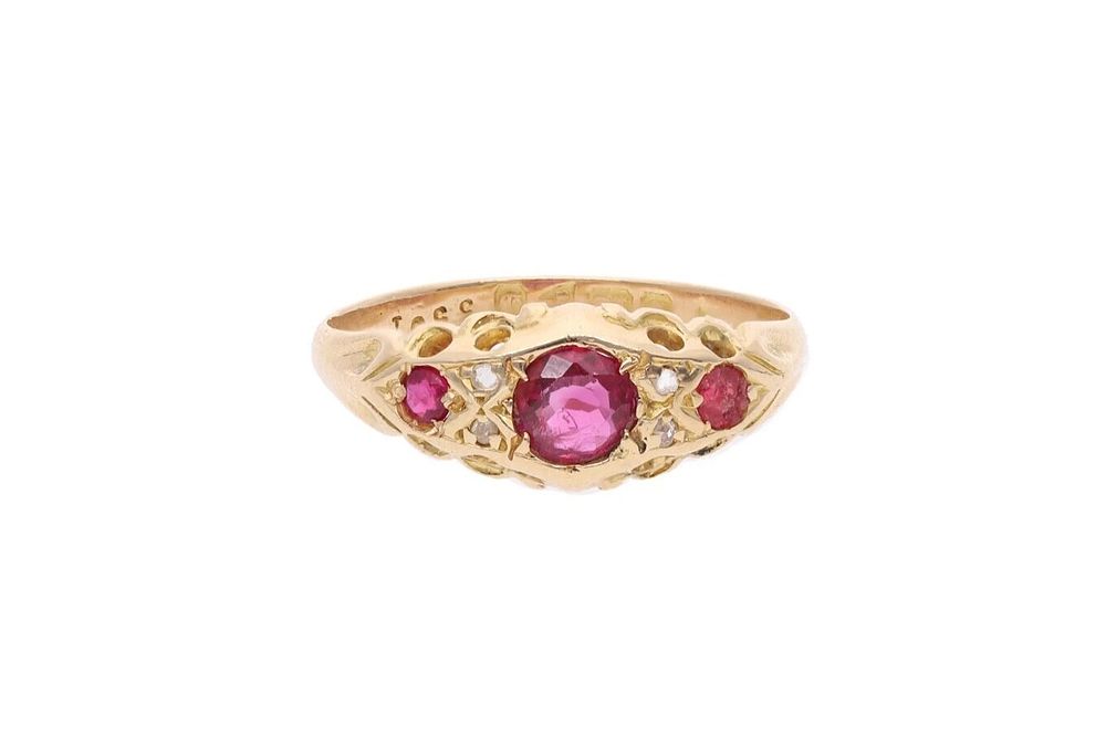 Lot 384: Antique 18ct Gold Ruby and Diamond Three Stone Ring, Size
