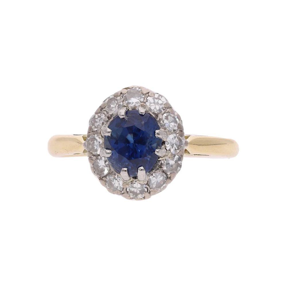 Lot 427: 18ct Gold Platinum Sapphire and Diamond Cluster Ring, Size M.