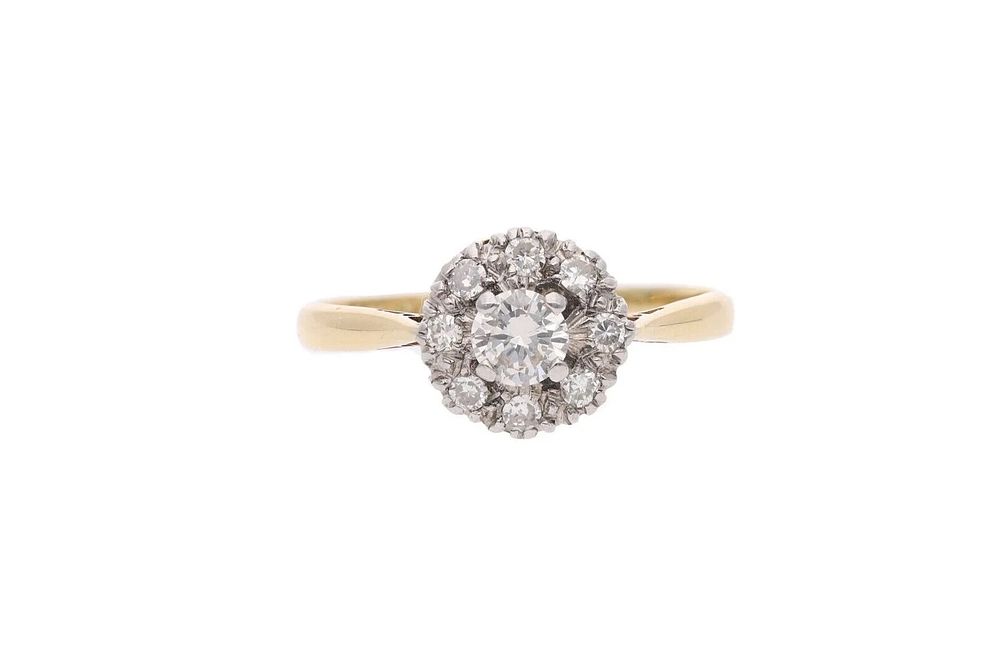 Lot 453: Antique 18ct Gold Platinum and Diamond Cluster Ring.