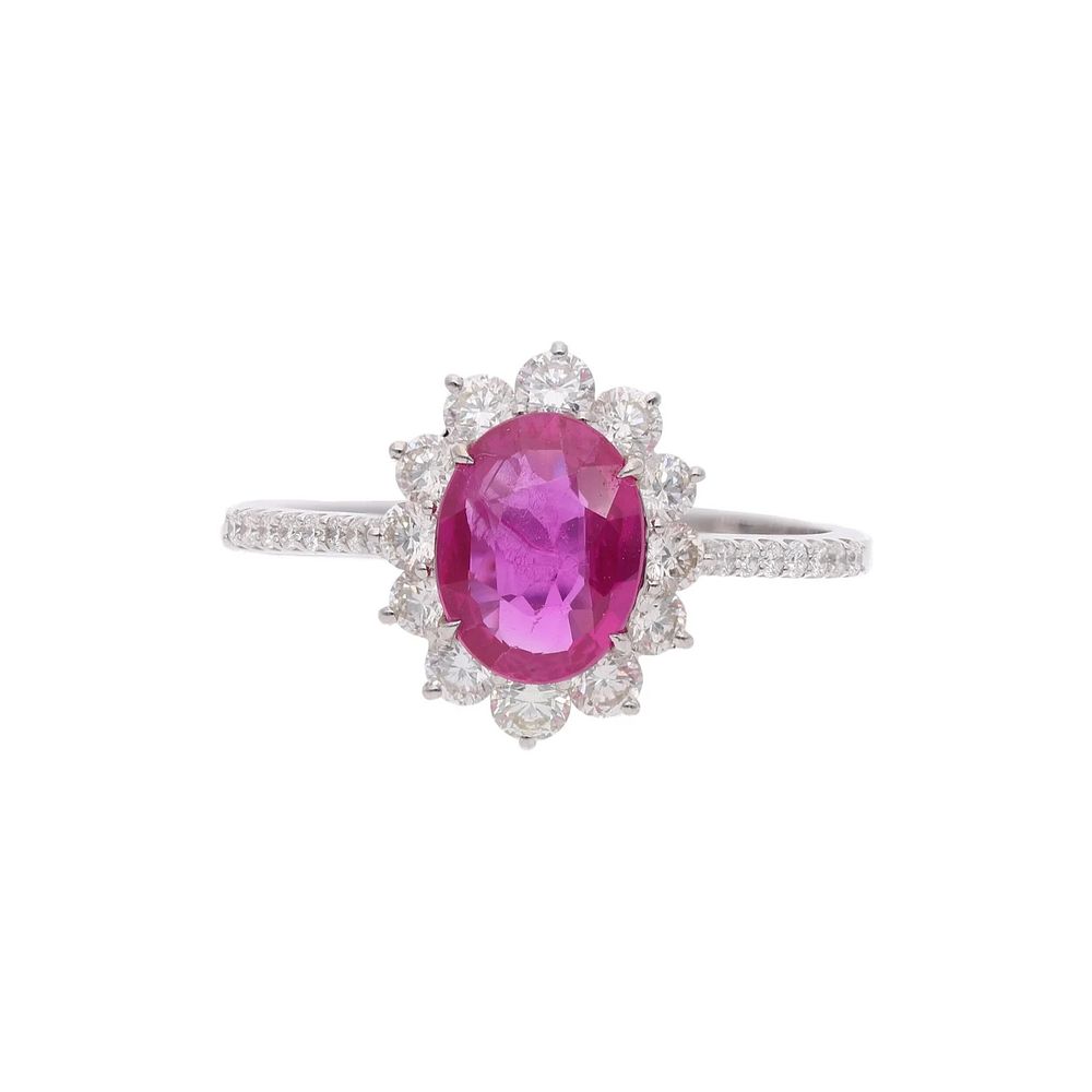 Lot 454: 18ct White Gold Ruby and Diamond Cluster Ring.