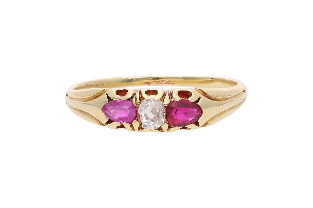 Lot 460: 18ct Gold Ruby and Diamond Three Stone Ring, Size M.